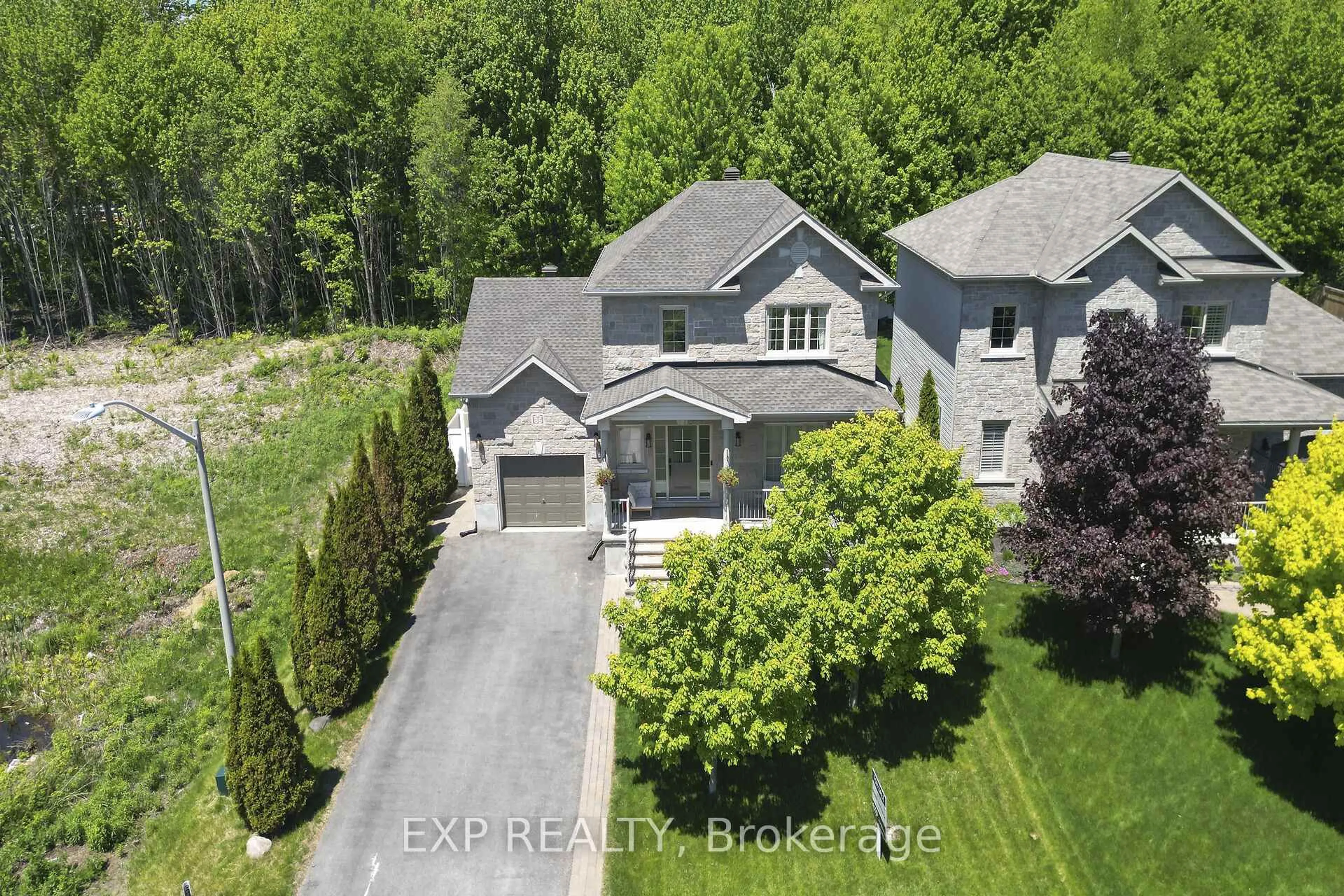 A pic from outside/outdoor area/front of a property/back of a property/a pic from drone, street for 86 Oasis St, The Nation Ontario K0A 2M0
