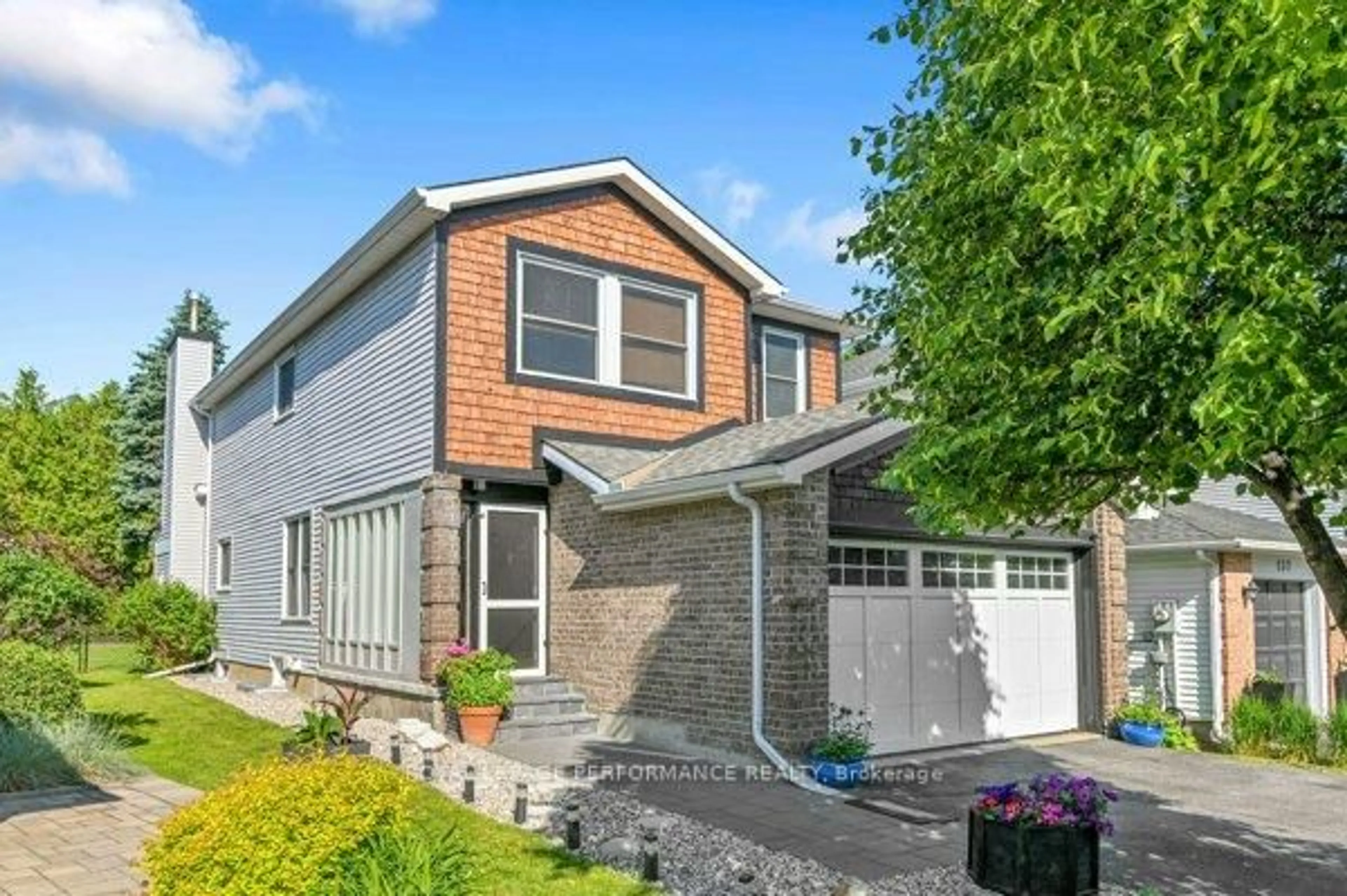 Home with brick exterior material, street for 135 Acklam Terr, Ottawa Ontario K2K 2J4
