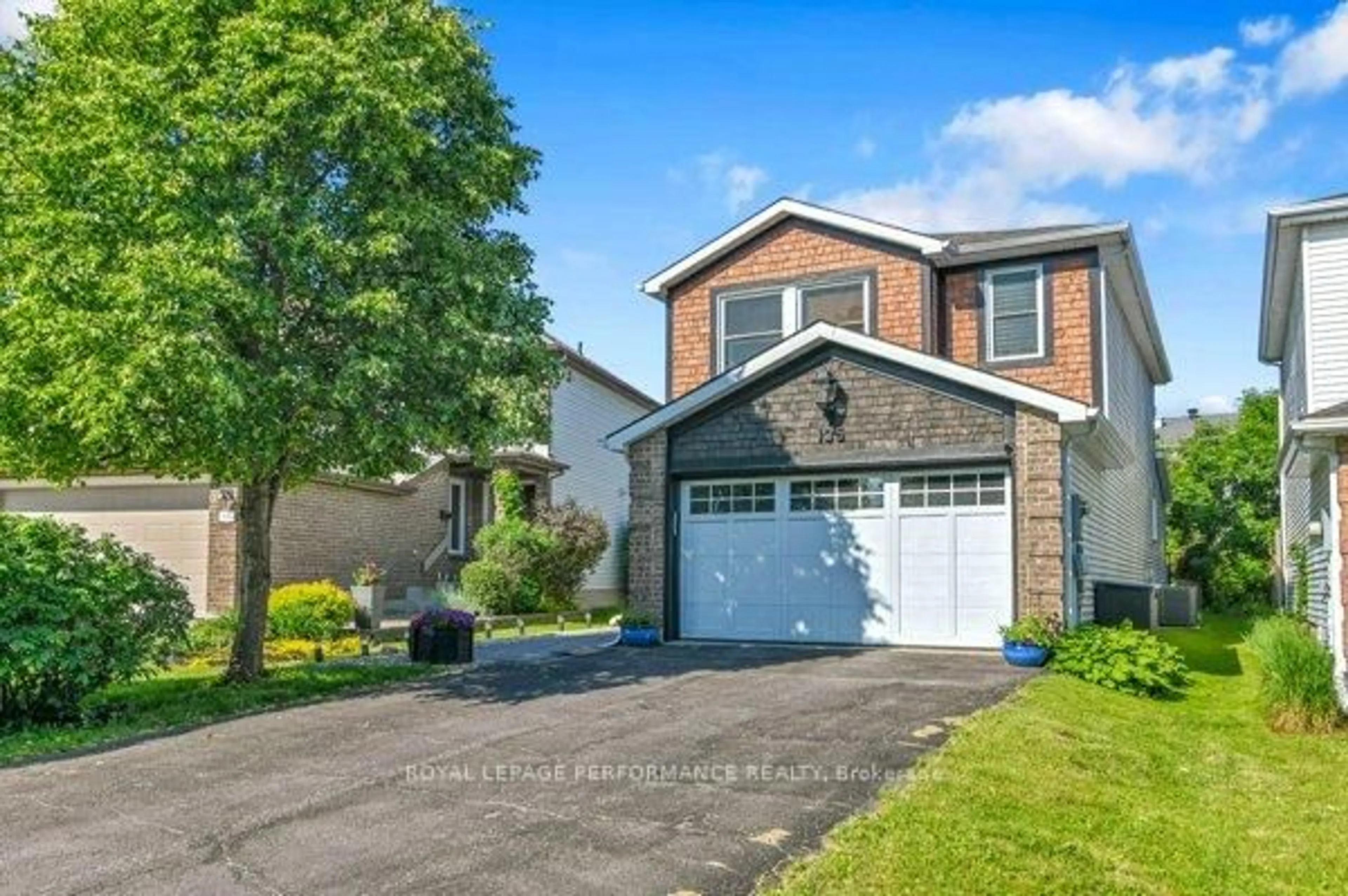 Home with brick exterior material, street for 135 Acklam Terr, Ottawa Ontario K2K 2J4