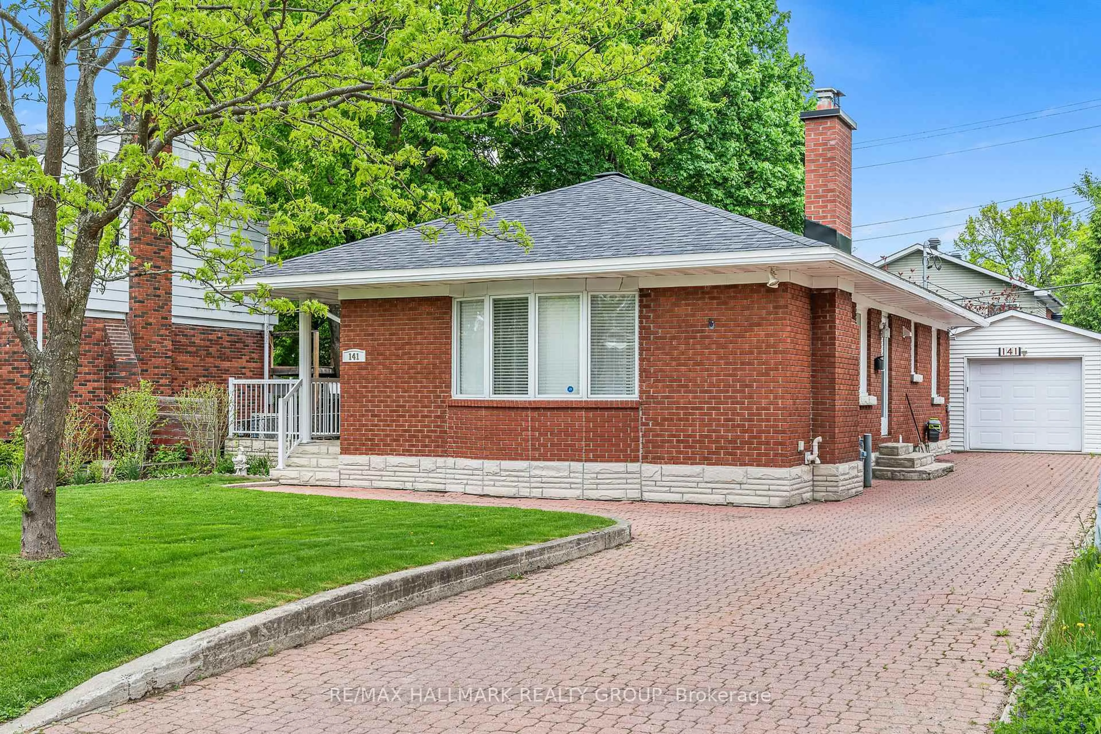 Home with brick exterior material, street for 141 DAHLIA Ave, Ottawa Ontario K1H 6G1