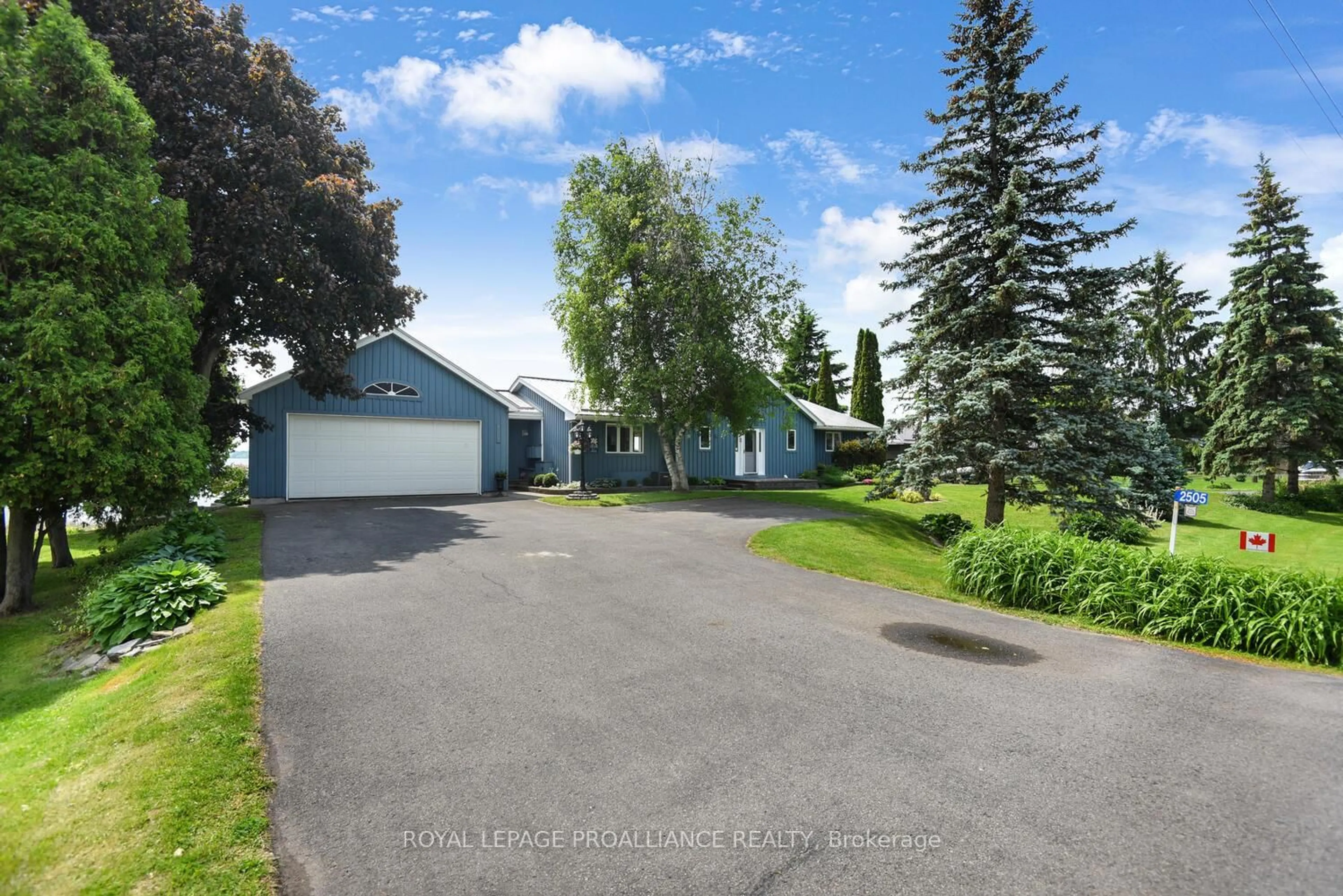 A pic from outside/outdoor area/front of a property/back of a property/a pic from drone, street for 2505 County 2 Rd, Edwardsburgh/Cardinal Ontario K0E 1T1
