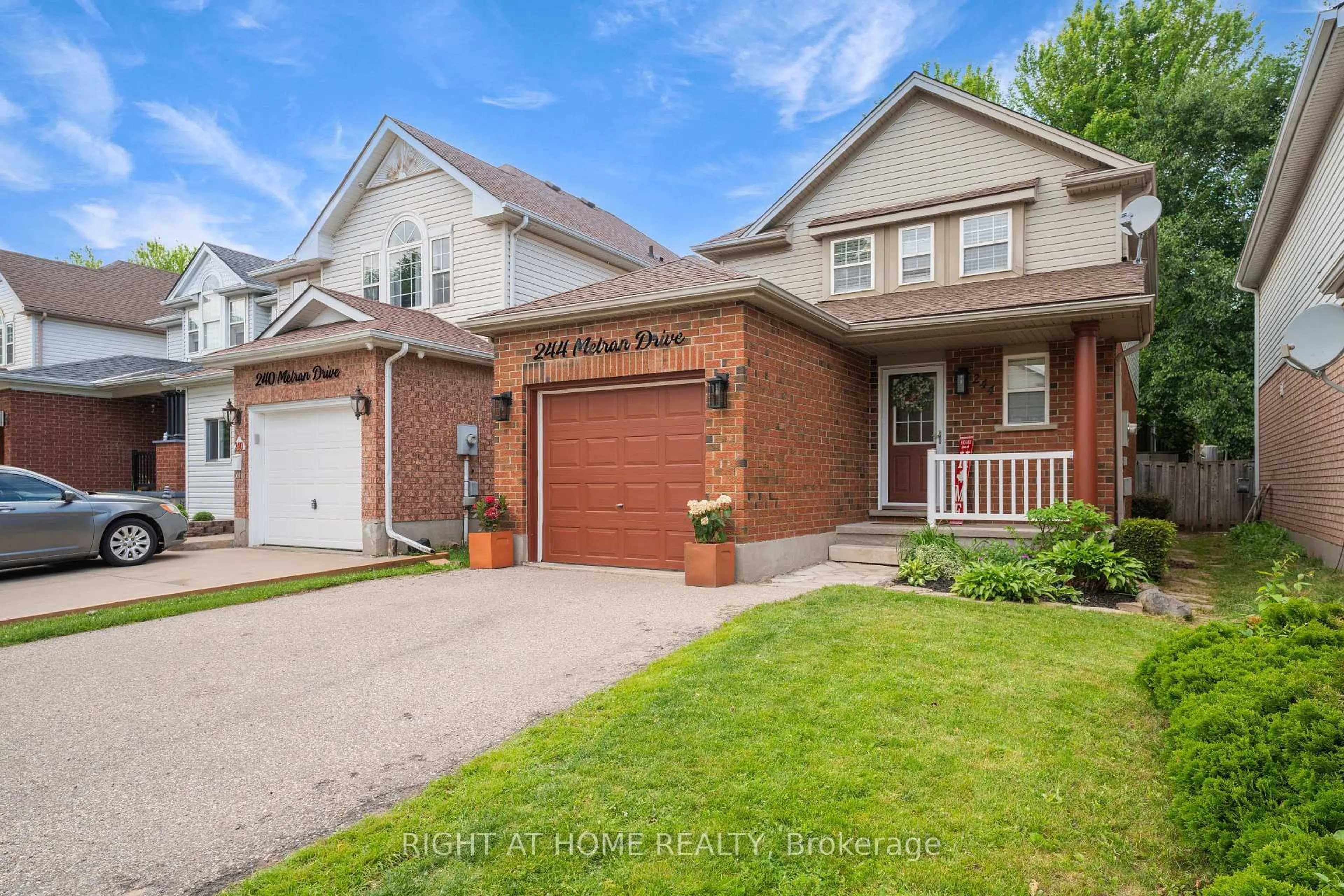 Home with brick exterior material, street for 244 Melran Dr, Cambridge Ontario N3C 4E5
