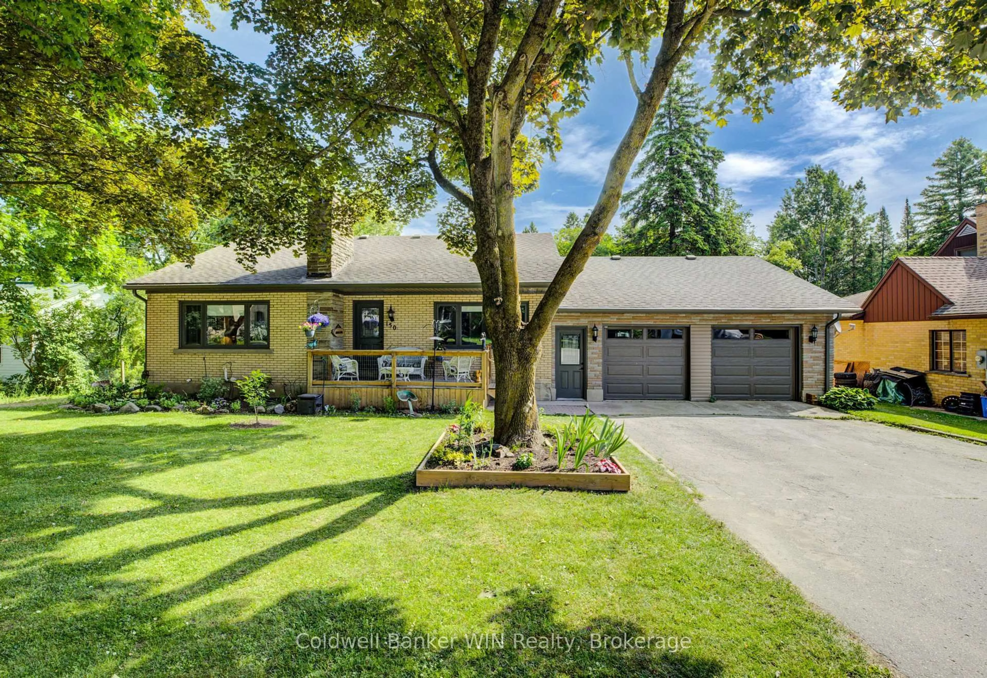Home with vinyl exterior material, street for 150 Normanby St, Wellington North Ontario N0G 2L1