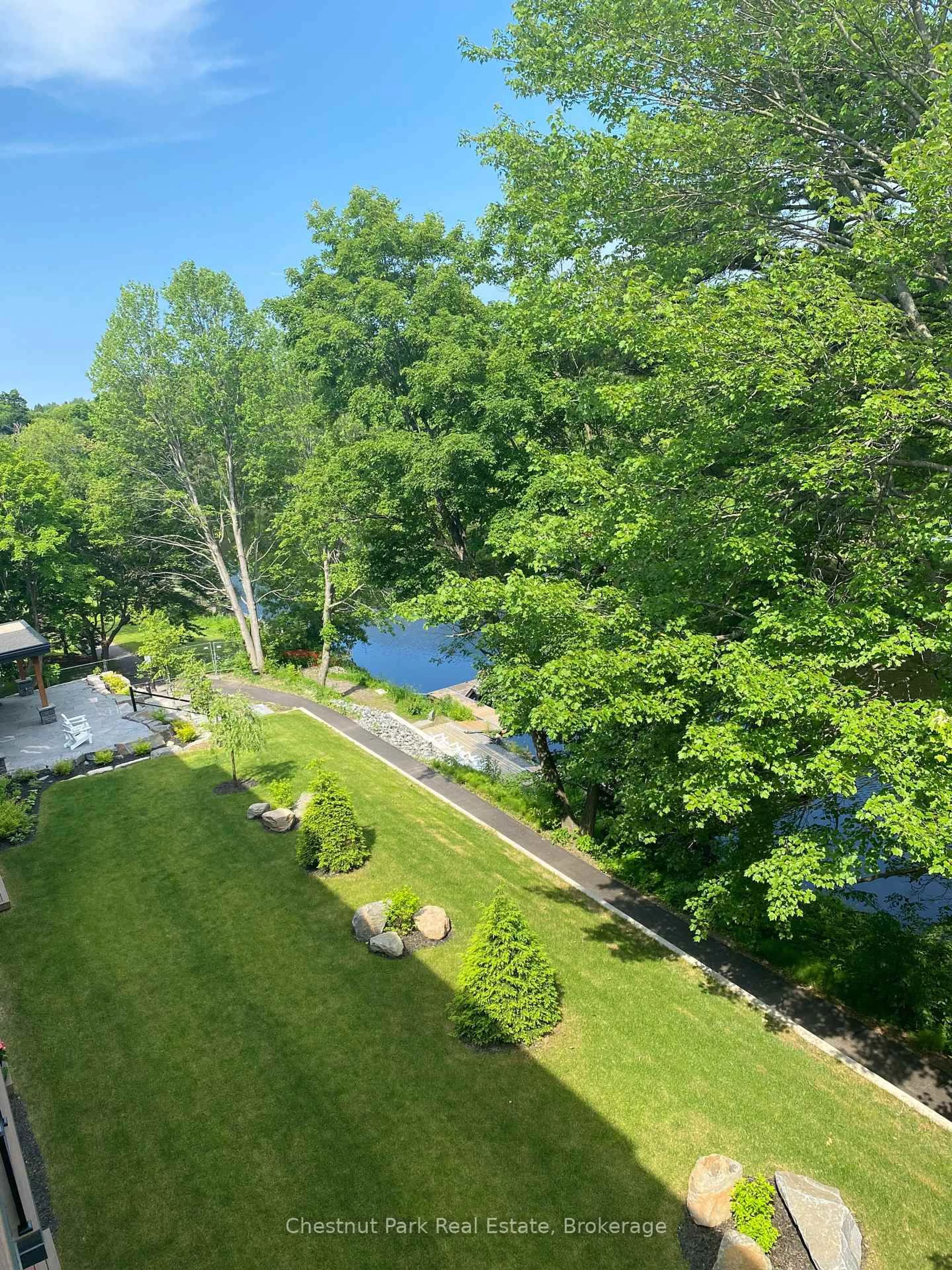 A pic from outside/outdoor area/front of a property/back of a property/a pic from drone, water/lake/river/ocean view for 404-200 ANGLO St, Bracebridge Ontario P1L 1G4
