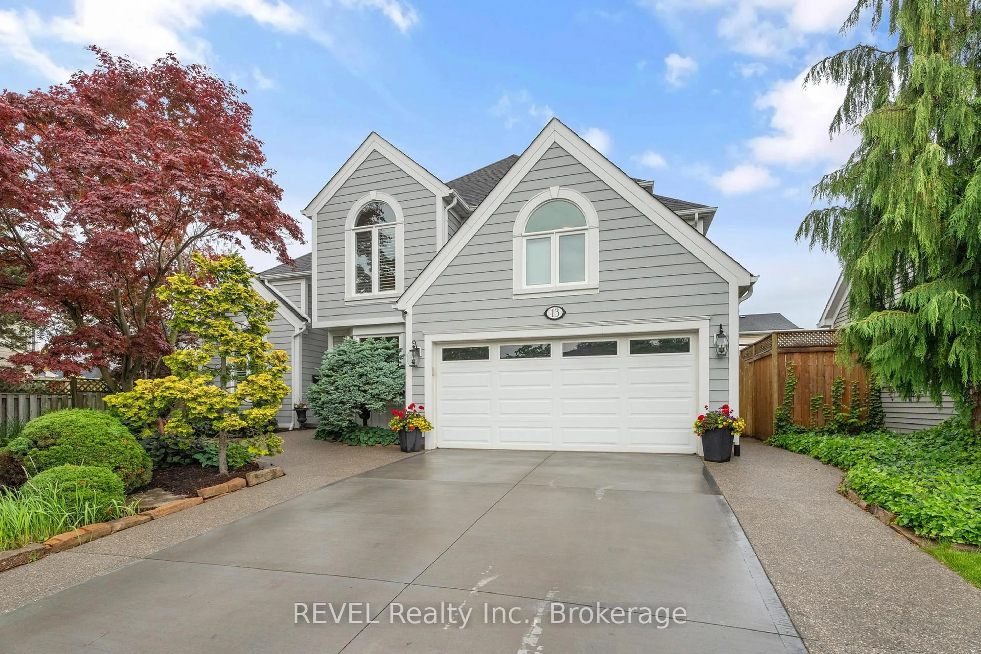 Home with vinyl exterior material, street for 13 Breckenridge Blvd, St. Catharines Ontario L2W 1A7