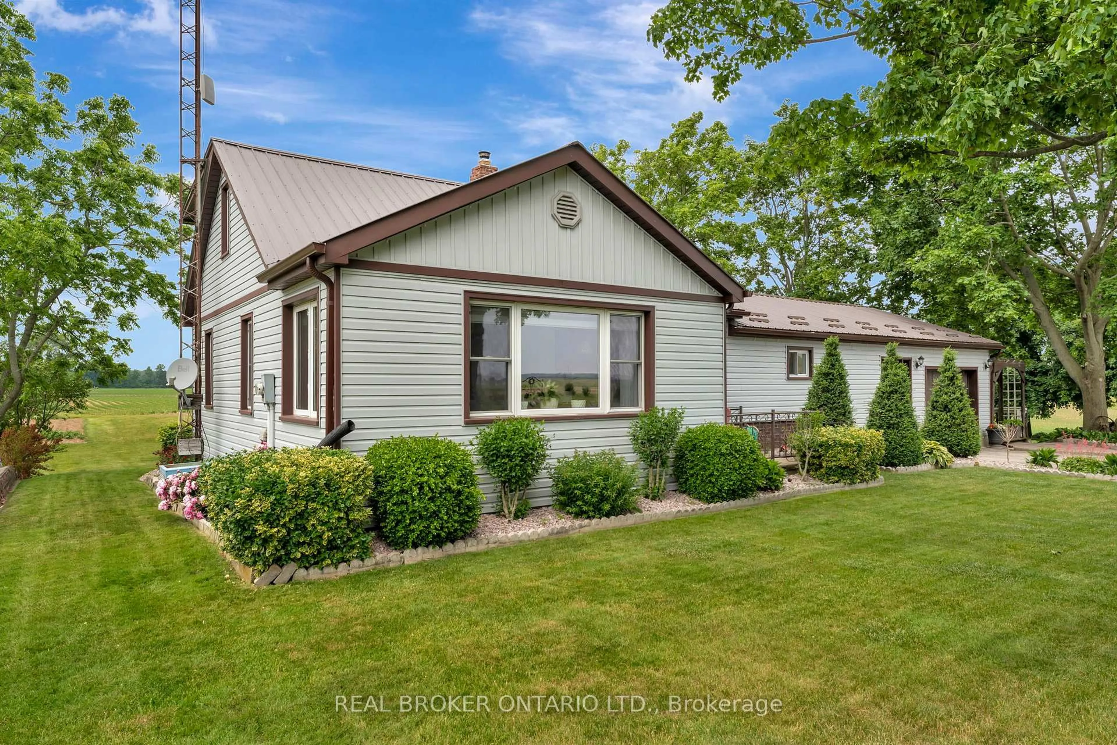 Home with vinyl exterior material, street for 1331 12th Concession Rd, Norfolk Ontario N0E 1G0