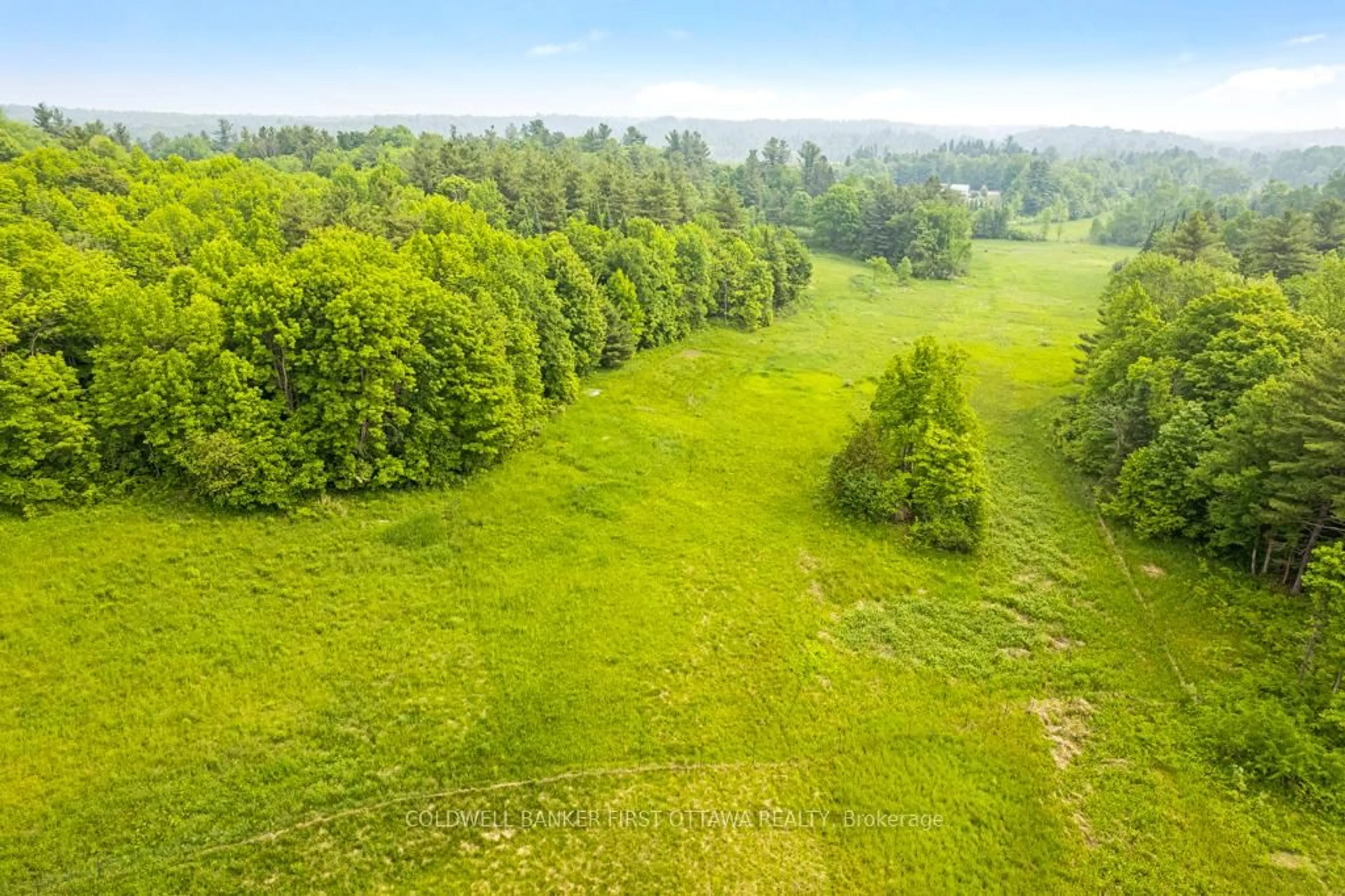 A pic from outside/outdoor area/front of a property/back of a property/a pic from drone, forest/trees view for 301 Maberly Station Rd, Maberly Ontario K0H 2B0