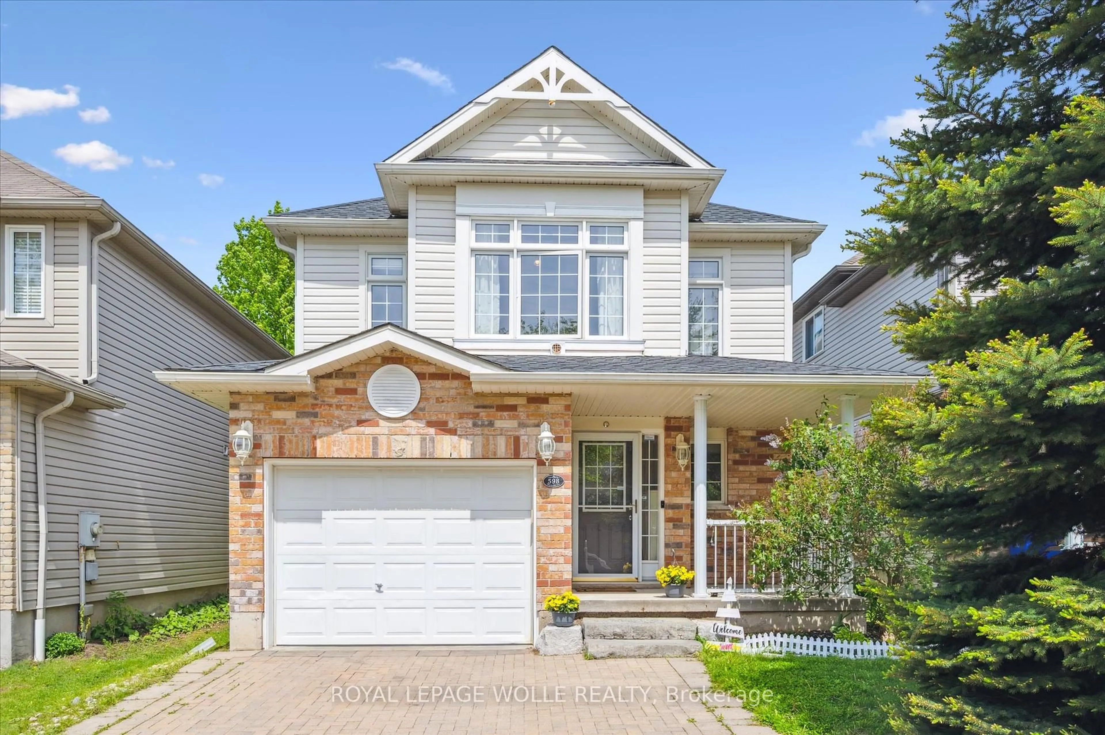 Home with brick exterior material, street for 598 Woolgrass Ave, Waterloo Ontario N2V 2X8
