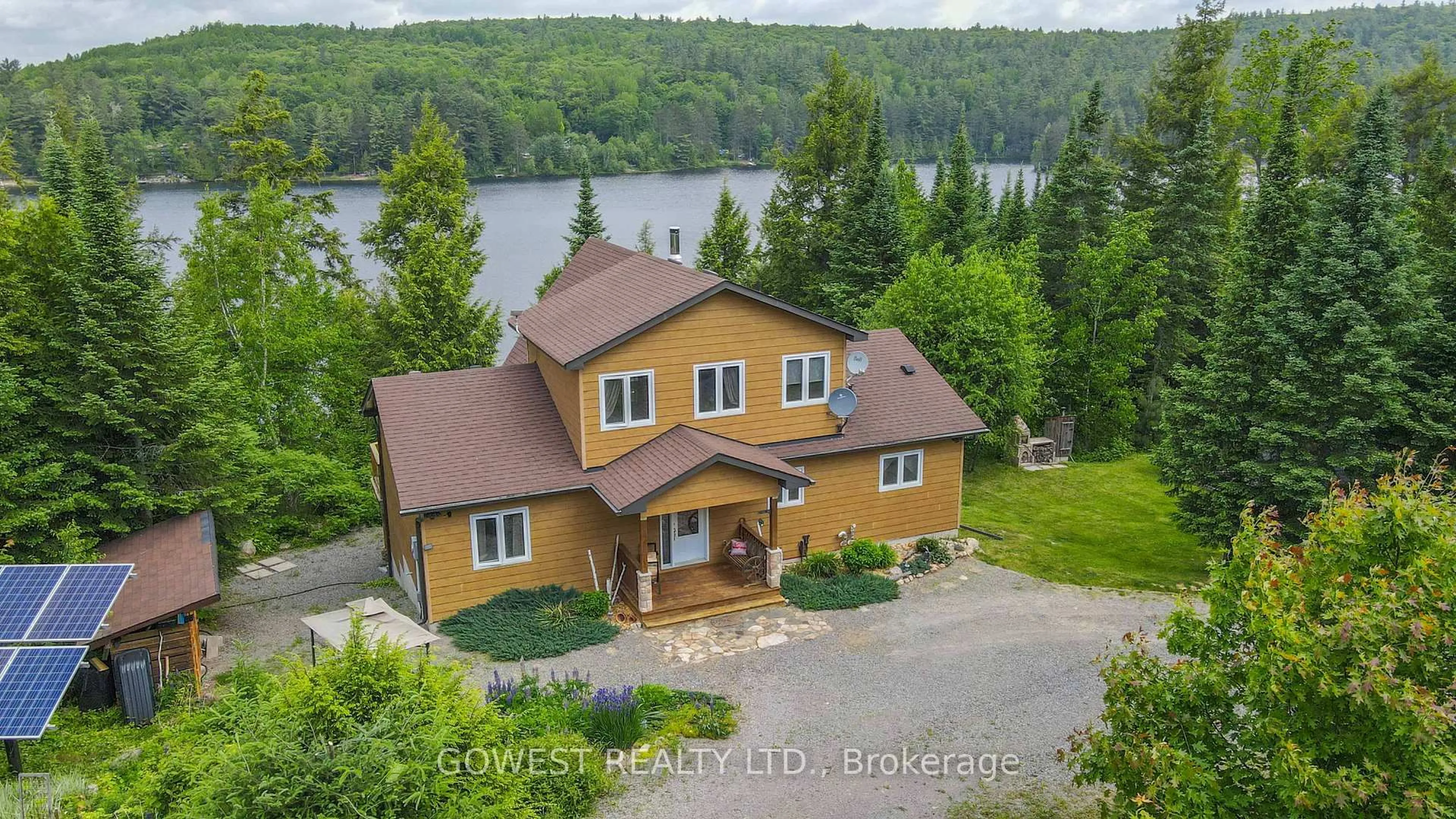 A pic from outside/outdoor area/front of a property/back of a property/a pic from drone, water/lake/river/ocean view for 153B MARTIN RECOSKIE Rd, Barry's Bay Ontario K0J 1B0