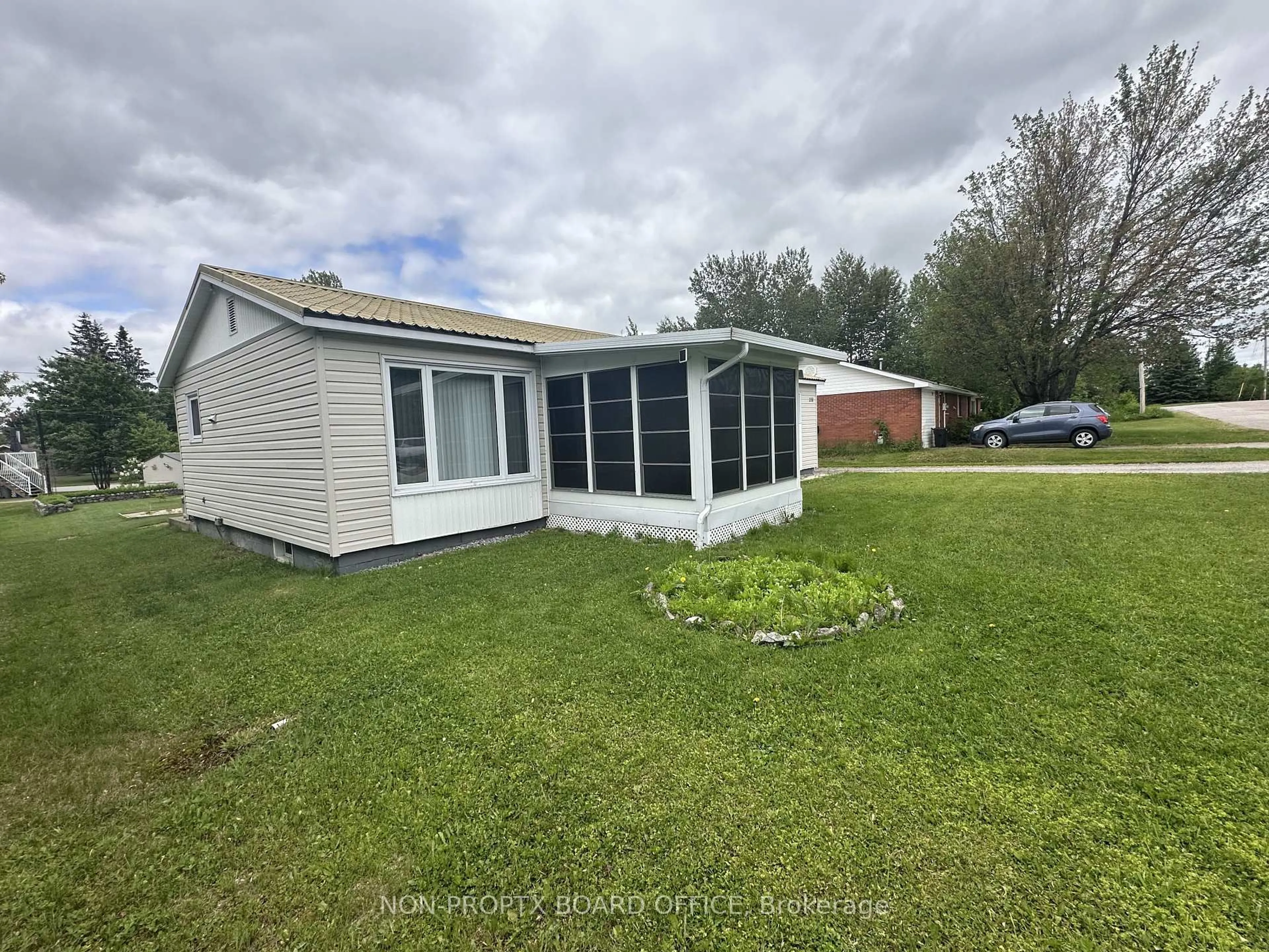 A pic from outside/outdoor area/front of a property/back of a property/a pic from drone, water/lake/river/ocean view for 213 OTTAWA St, West Nipissing Ontario P2B 3H5