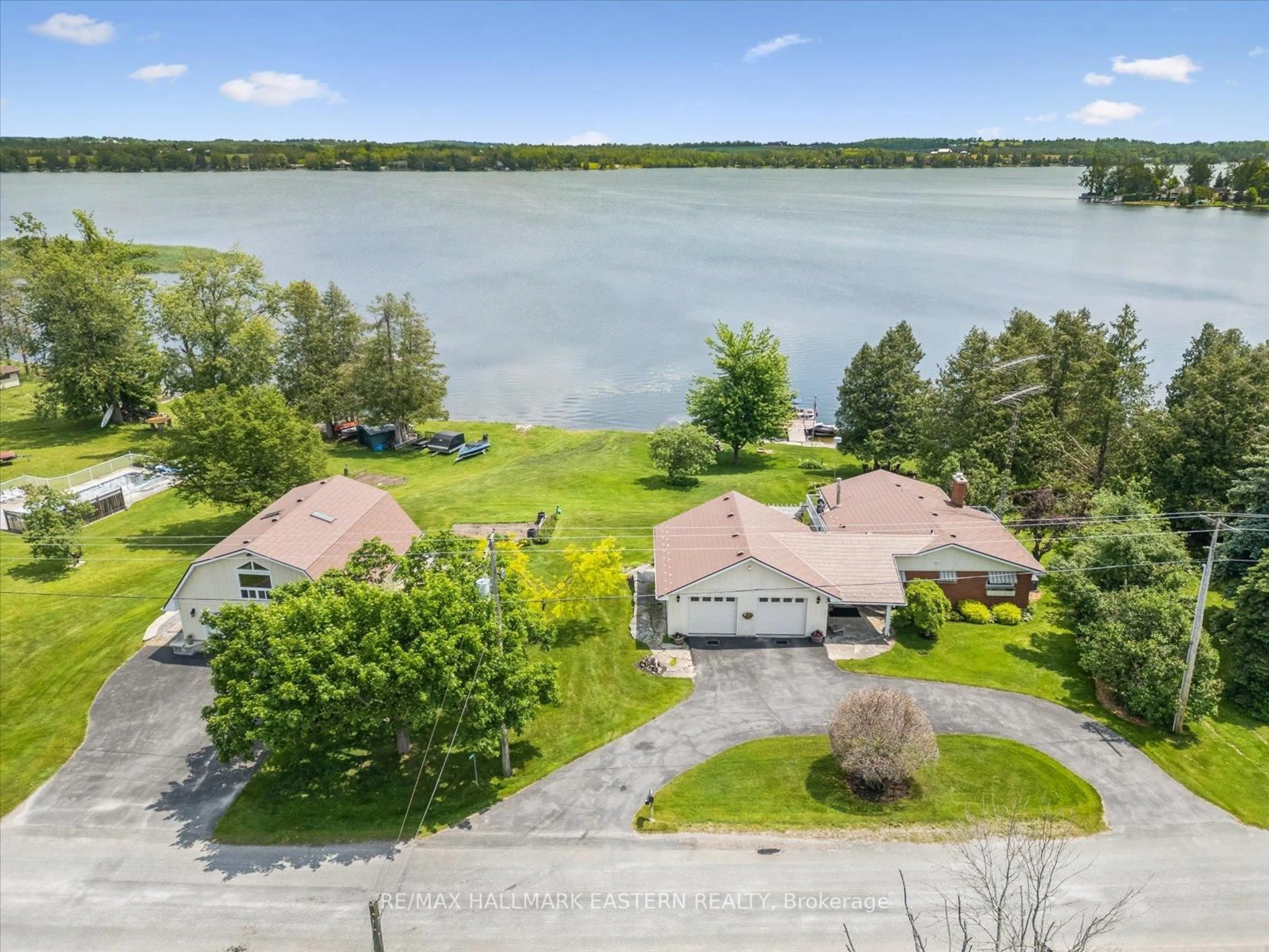 A pic from outside/outdoor area/front of a property/back of a property/a pic from drone, water/lake/river/ocean view for 1105 Connaught Dr, Selwyn Ontario K0L 1T0