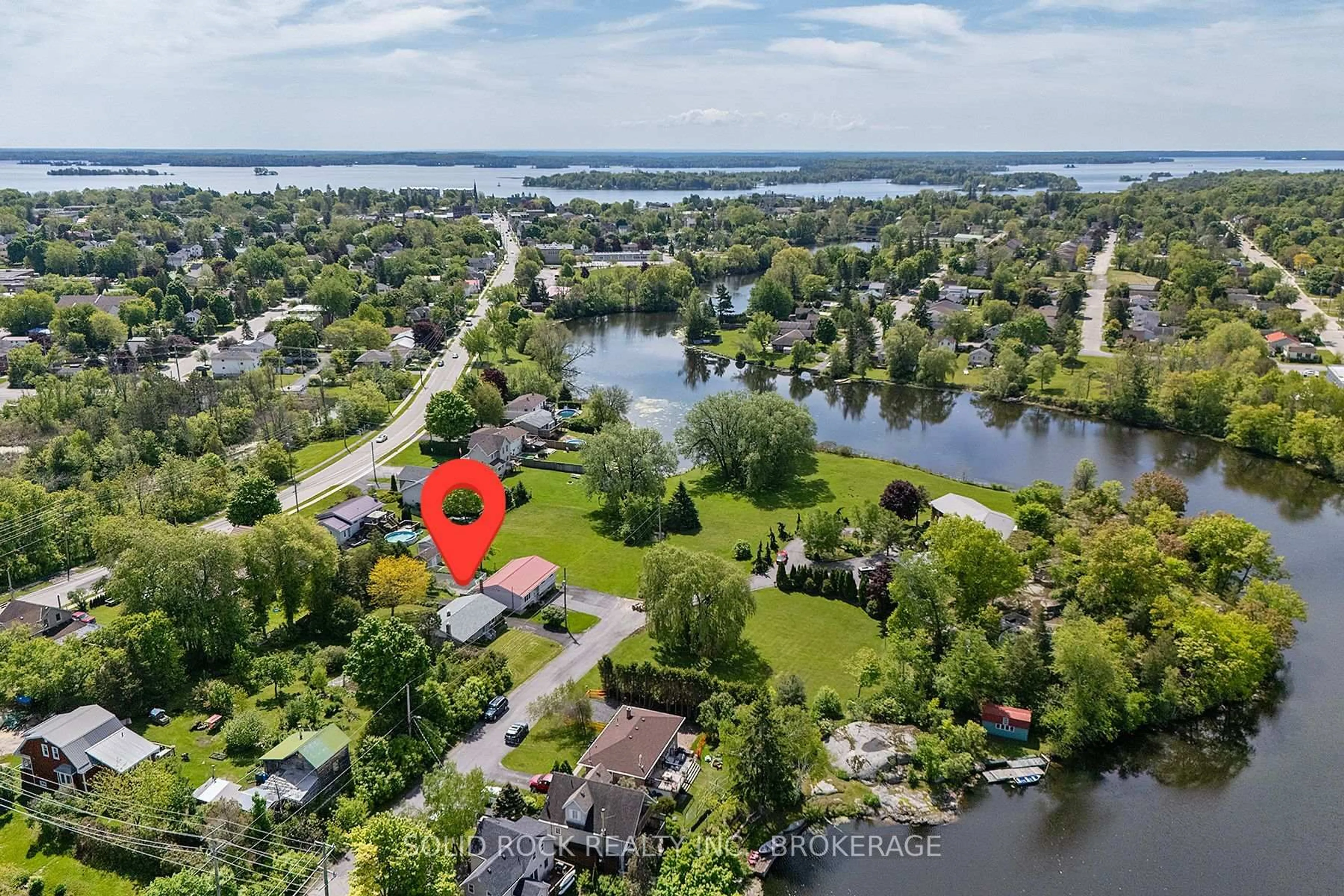 A pic from outside/outdoor area/front of a property/back of a property/a pic from drone, water/lake/river/ocean view for 565 Queen St, Gananoque Ontario K7G 2A9