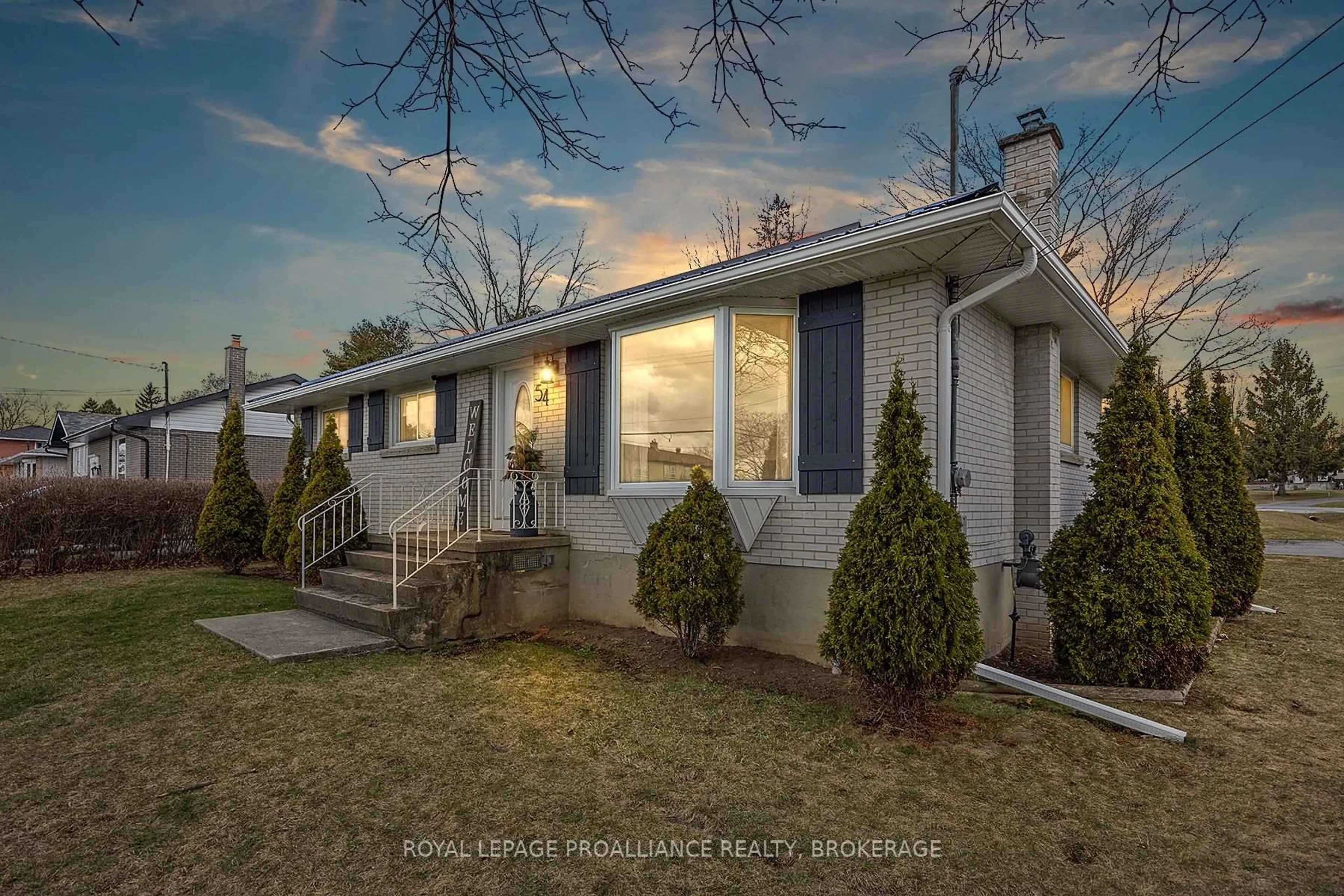 Home with vinyl exterior material, street for 54 Amherst Dr, Loyalist Ontario K7M 9K7
