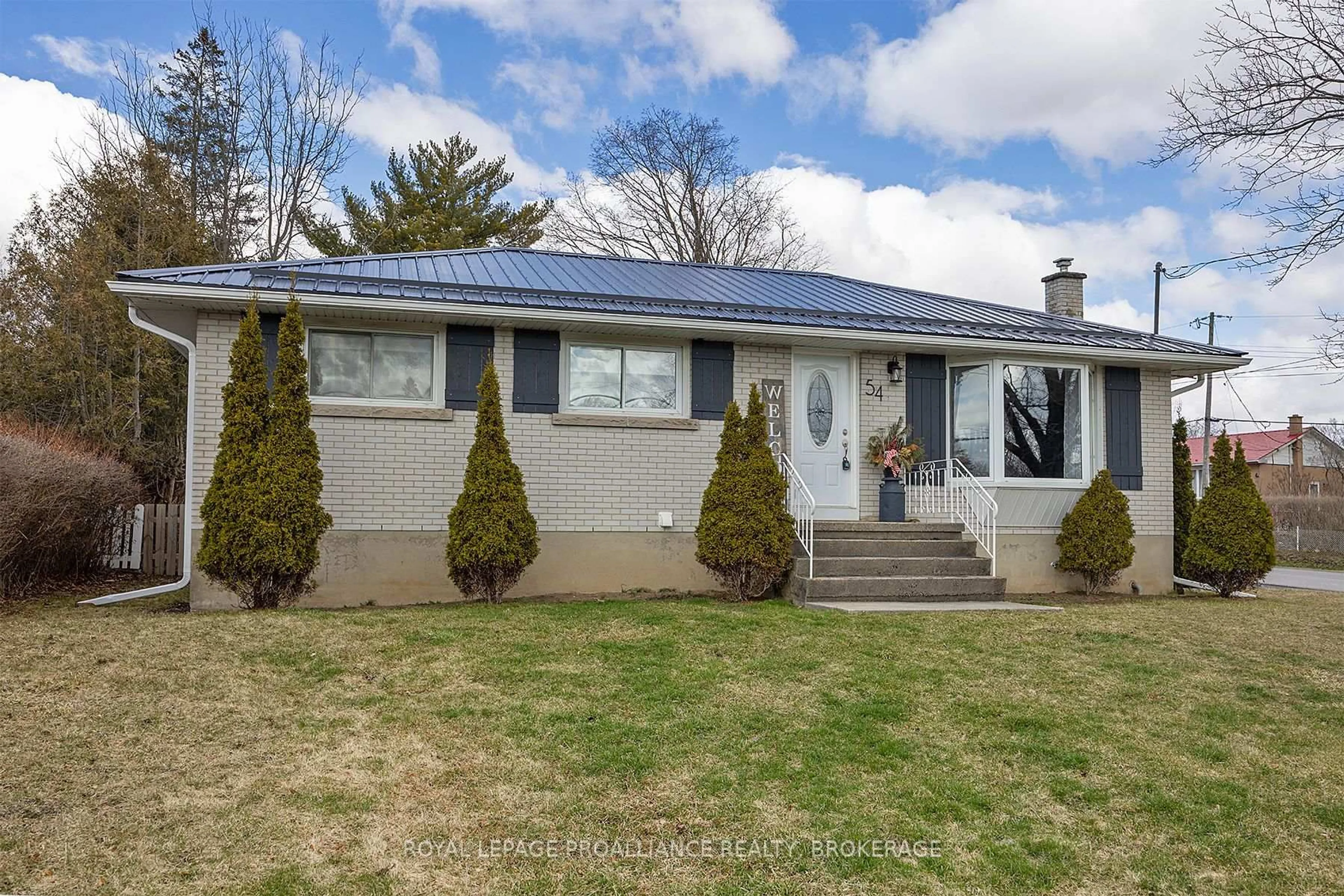 Home with vinyl exterior material, street for 54 Amherst Dr, Loyalist Ontario K7M 9K7