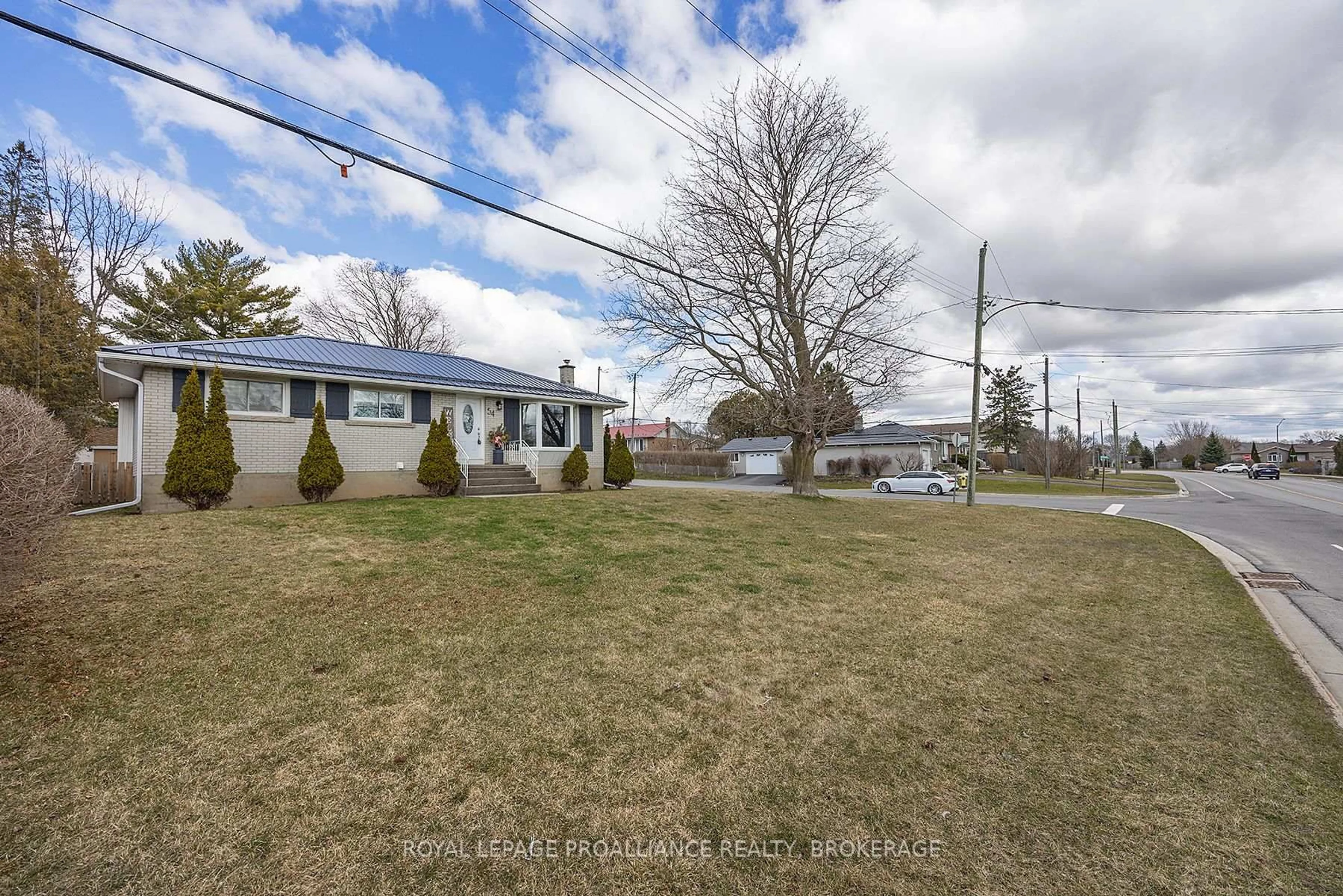 A pic from outside/outdoor area/front of a property/back of a property/a pic from drone, street for 54 Amherst Dr, Loyalist Ontario K7M 9K7