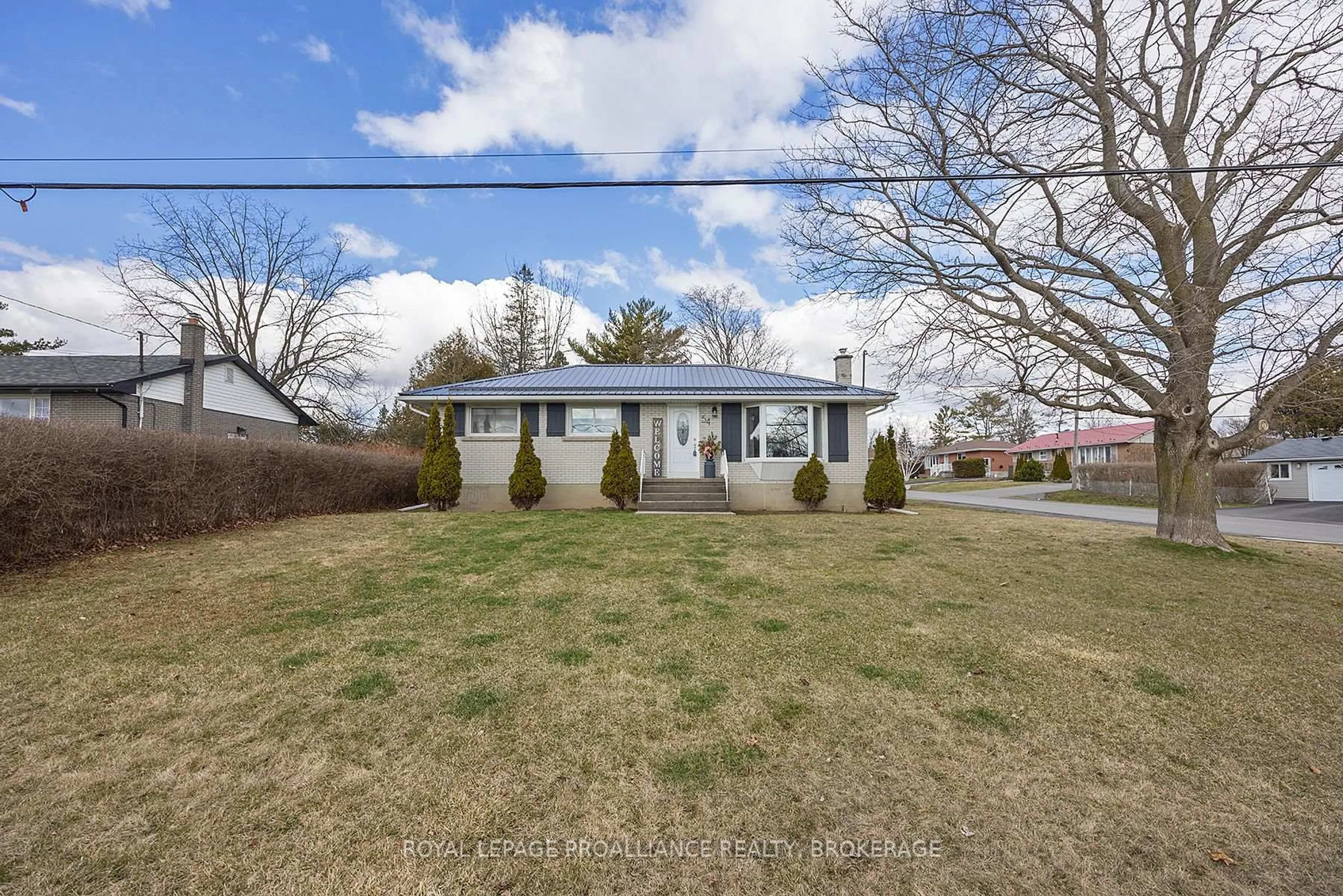 A pic from outside/outdoor area/front of a property/back of a property/a pic from drone, street for 54 Amherst Dr, Loyalist Ontario K7M 9K7