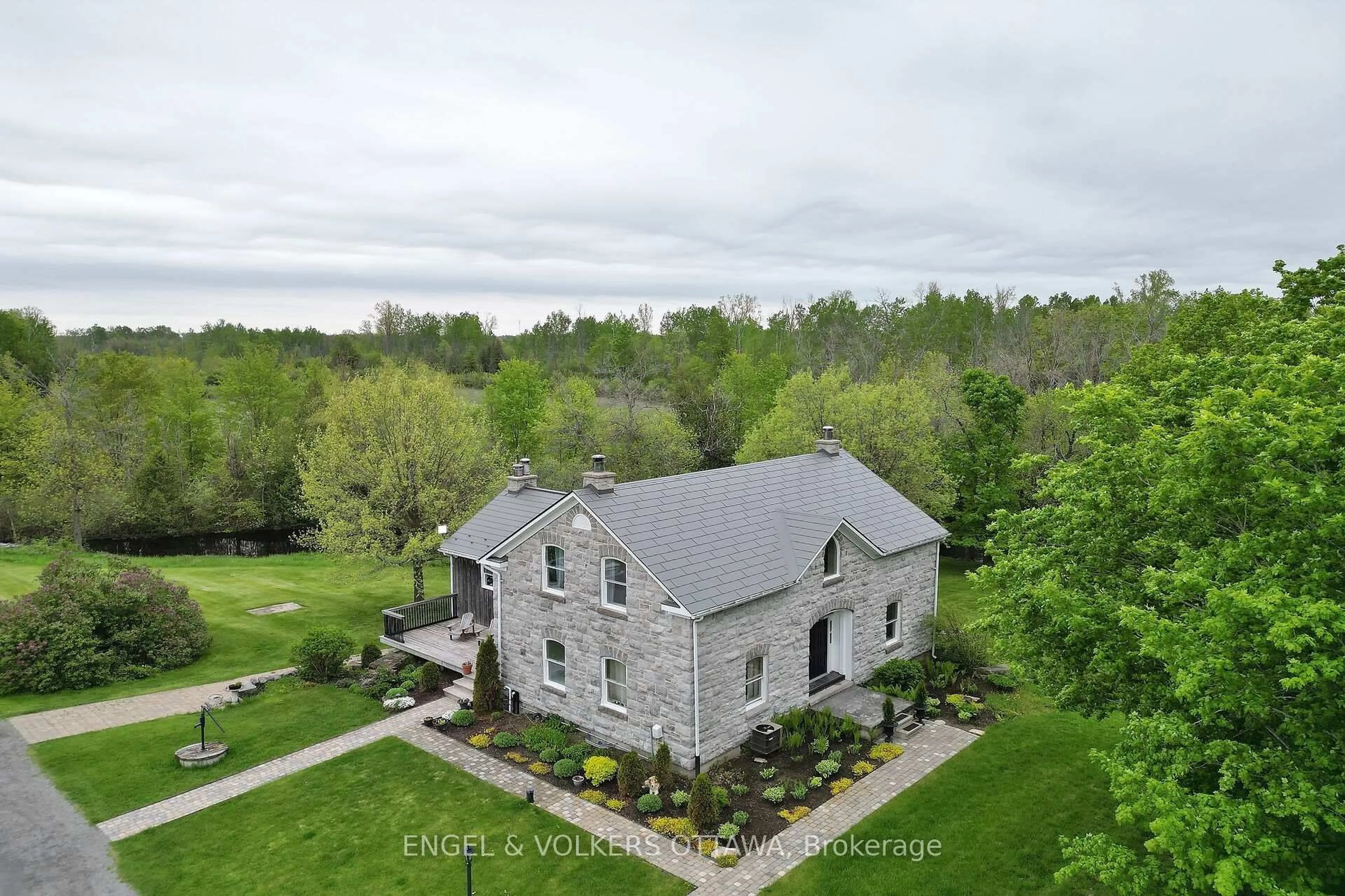 A pic from outside/outdoor area/front of a property/back of a property/a pic from drone, building for 3000 Roger Stevens Dr, North Gower Ontario K0A 2T0