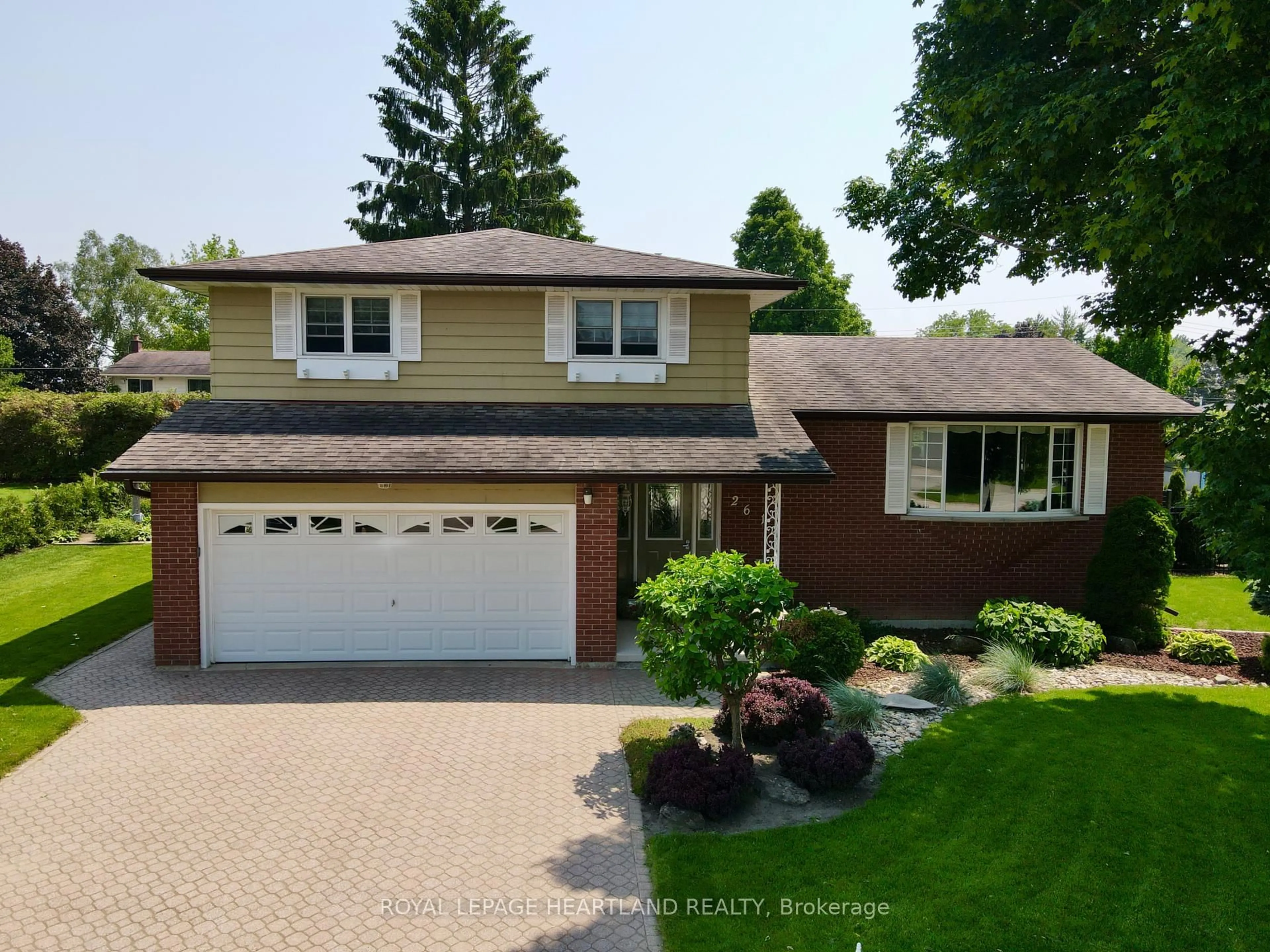 Home with brick exterior material, street for 261 Churchill Dr, South Huron Ontario N0M 1S1