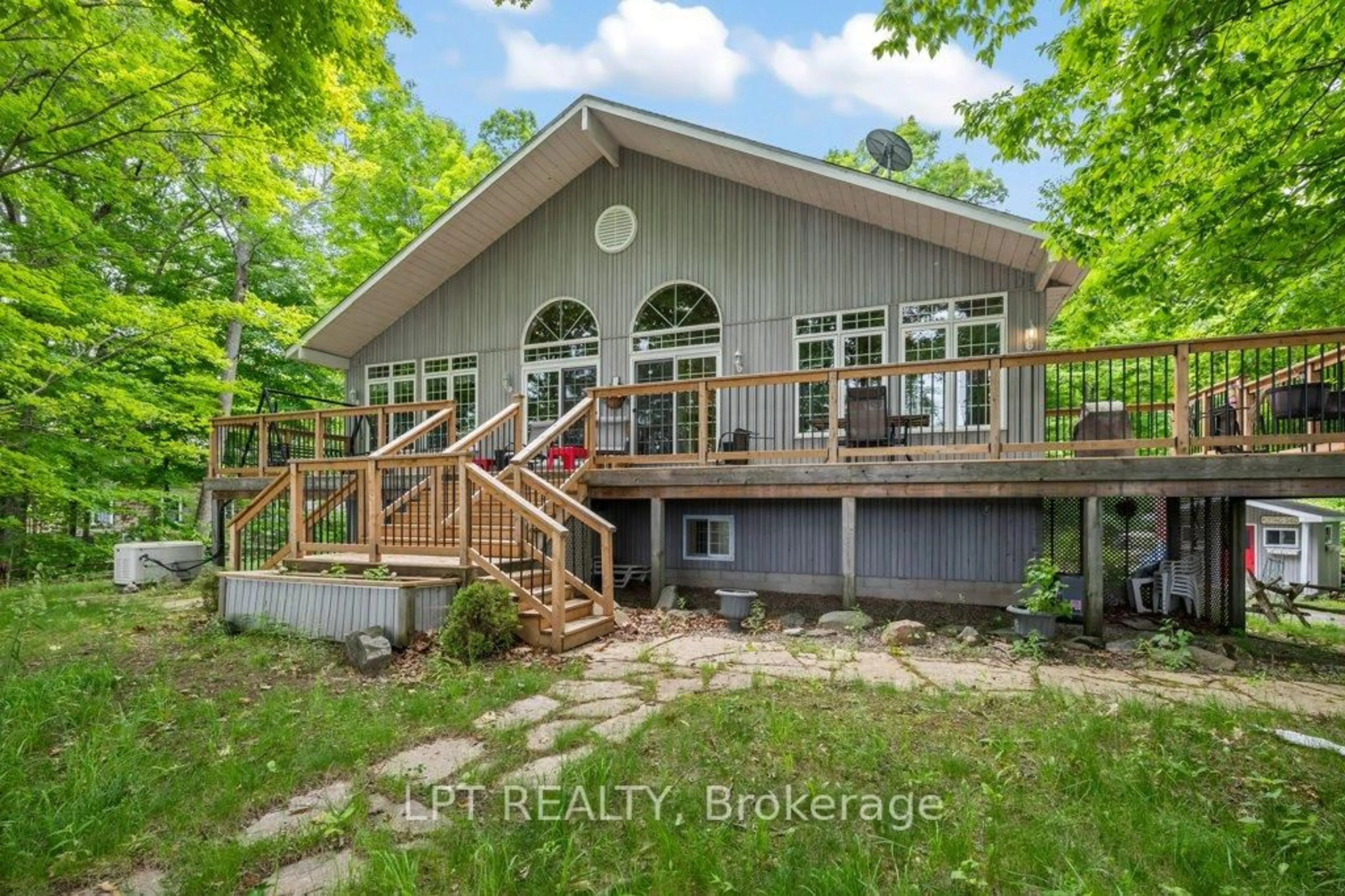 A pic from outside/outdoor area/front of a property/back of a property/a pic from drone, water/lake/river/ocean view for 1165 Dalton Lane, Godfrey Ontario K0H 1T0