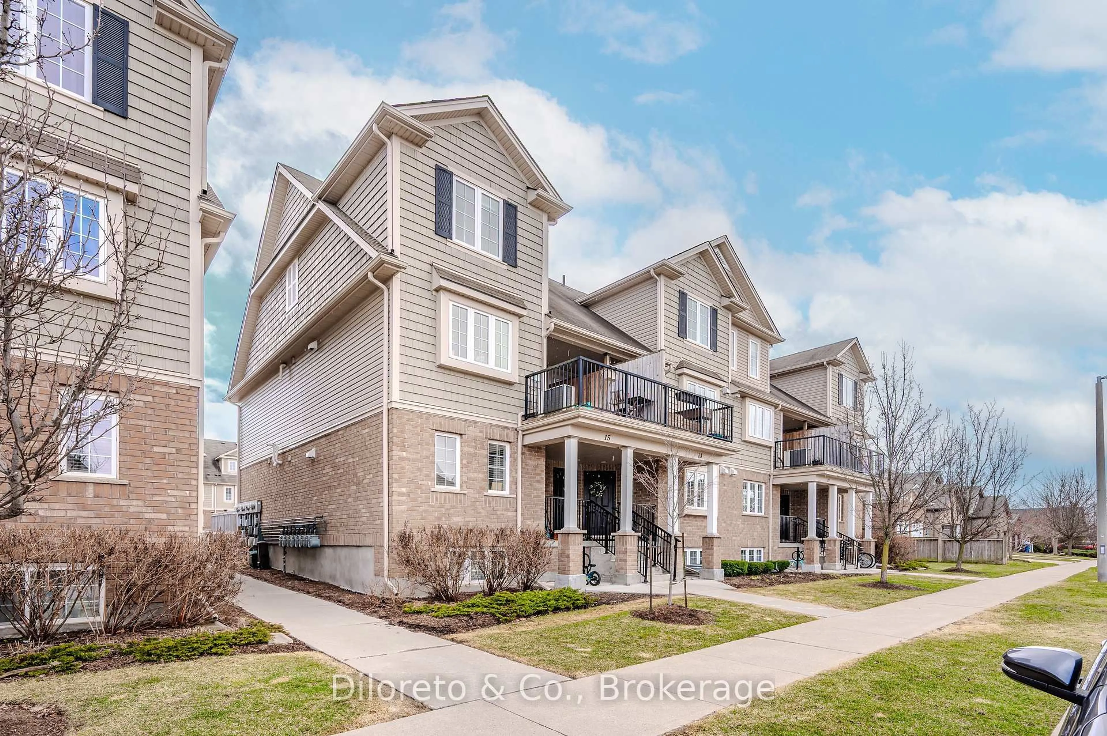 A pic from outside/outdoor area/front of a property/back of a property/a pic from drone, street for 15 Carere Cres #13A, Guelph Ontario N1E 0K4