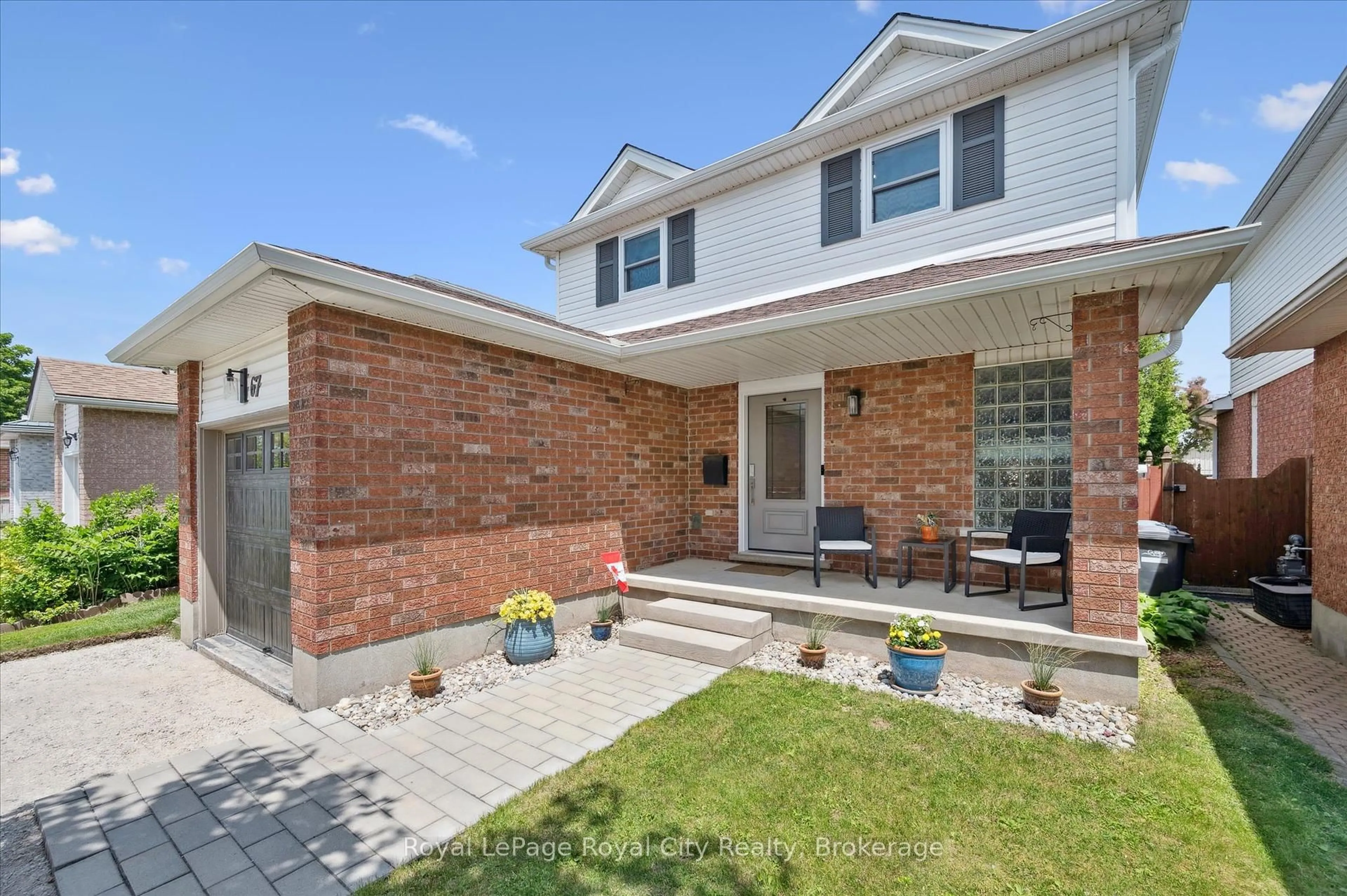 Home with brick exterior material, street for 67 Inverness Dr, Guelph Ontario N1E 6E4
