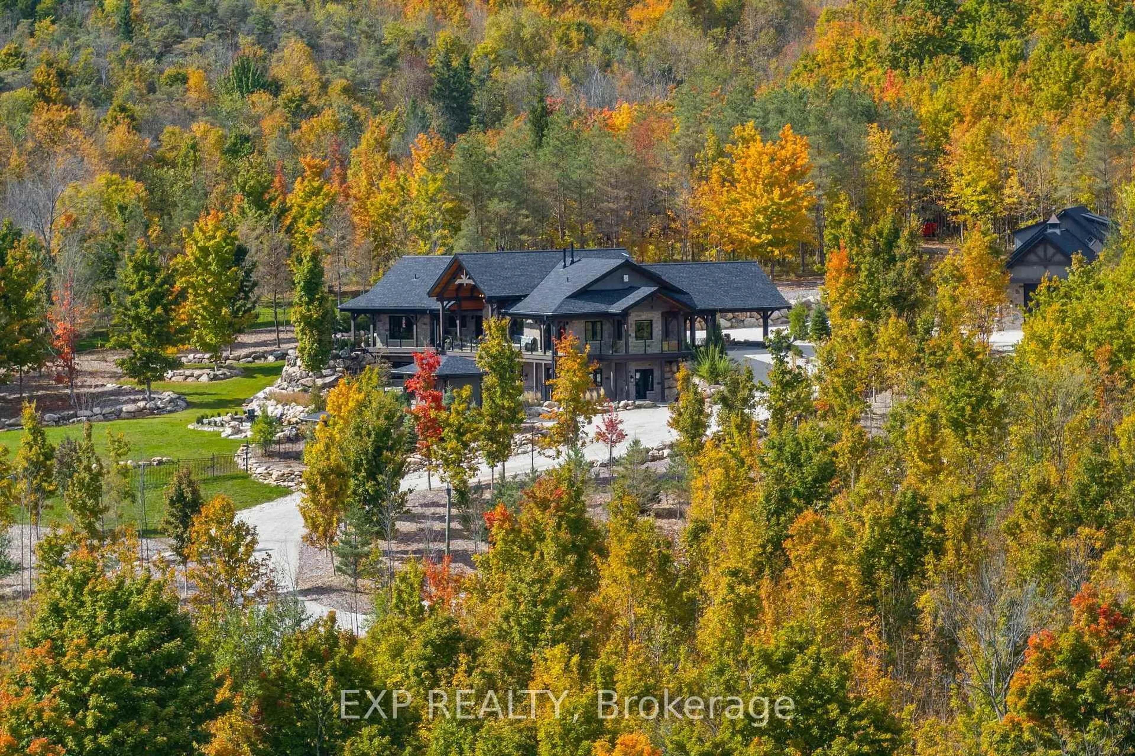 A pic from outside/outdoor area/front of a property/back of a property/a pic from drone, forest/trees view for 195718 Grey 7 Rd, Grey Highlands Ontario N0C 1G0