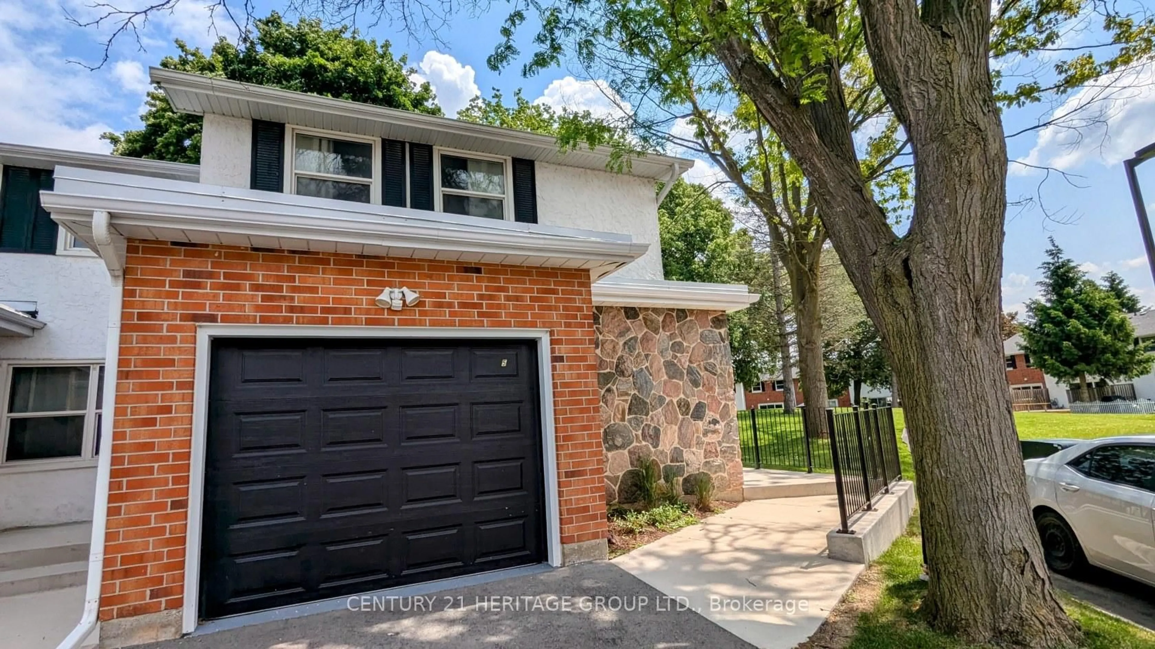 Home with brick exterior material, street for 431 Keats Way #5, Waterloo Ontario N2L 5S7