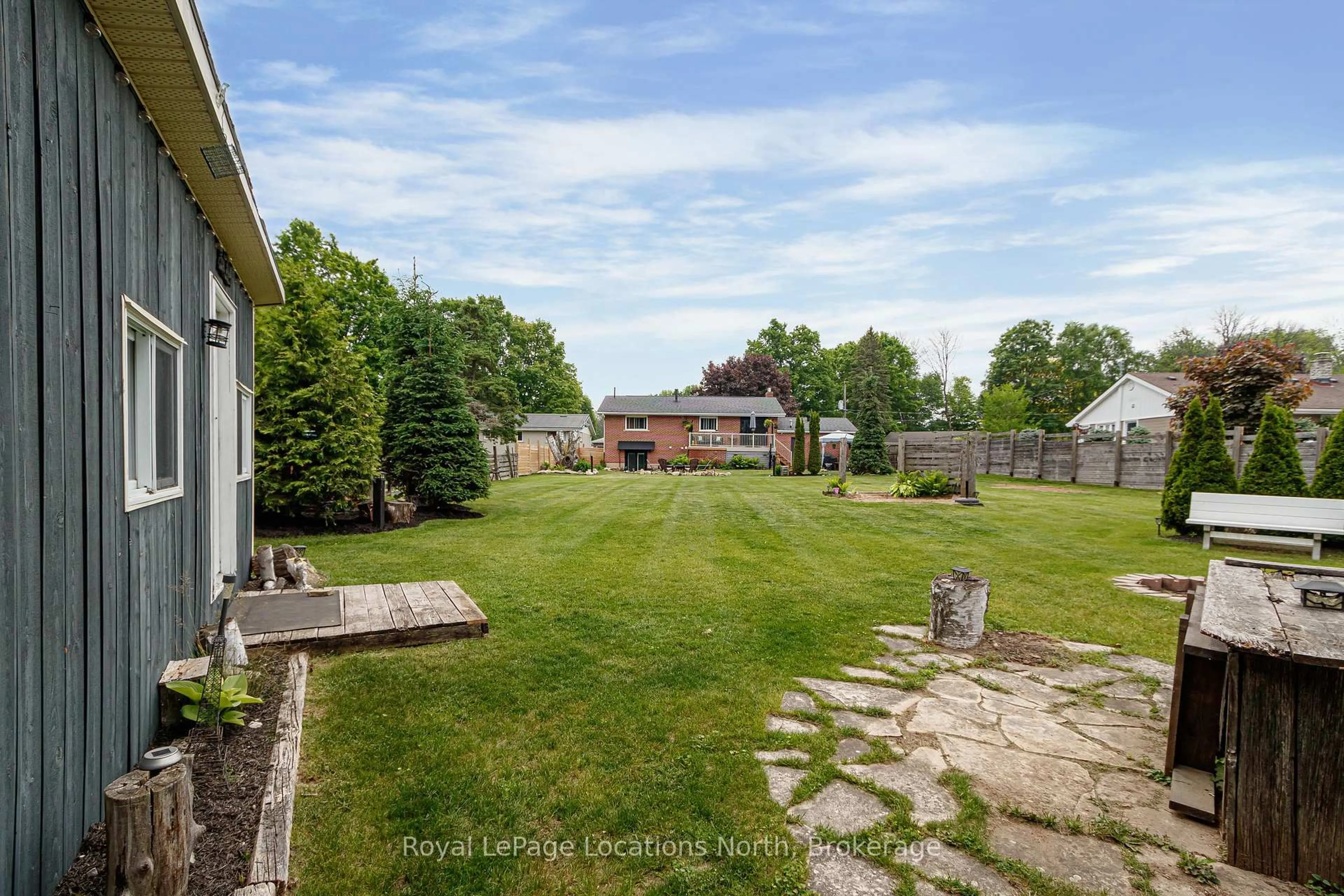 A pic from outside/outdoor area/front of a property/back of a property/a pic from drone, unknown for 128 Montgomery St, Meaford Ontario N4L 1C4