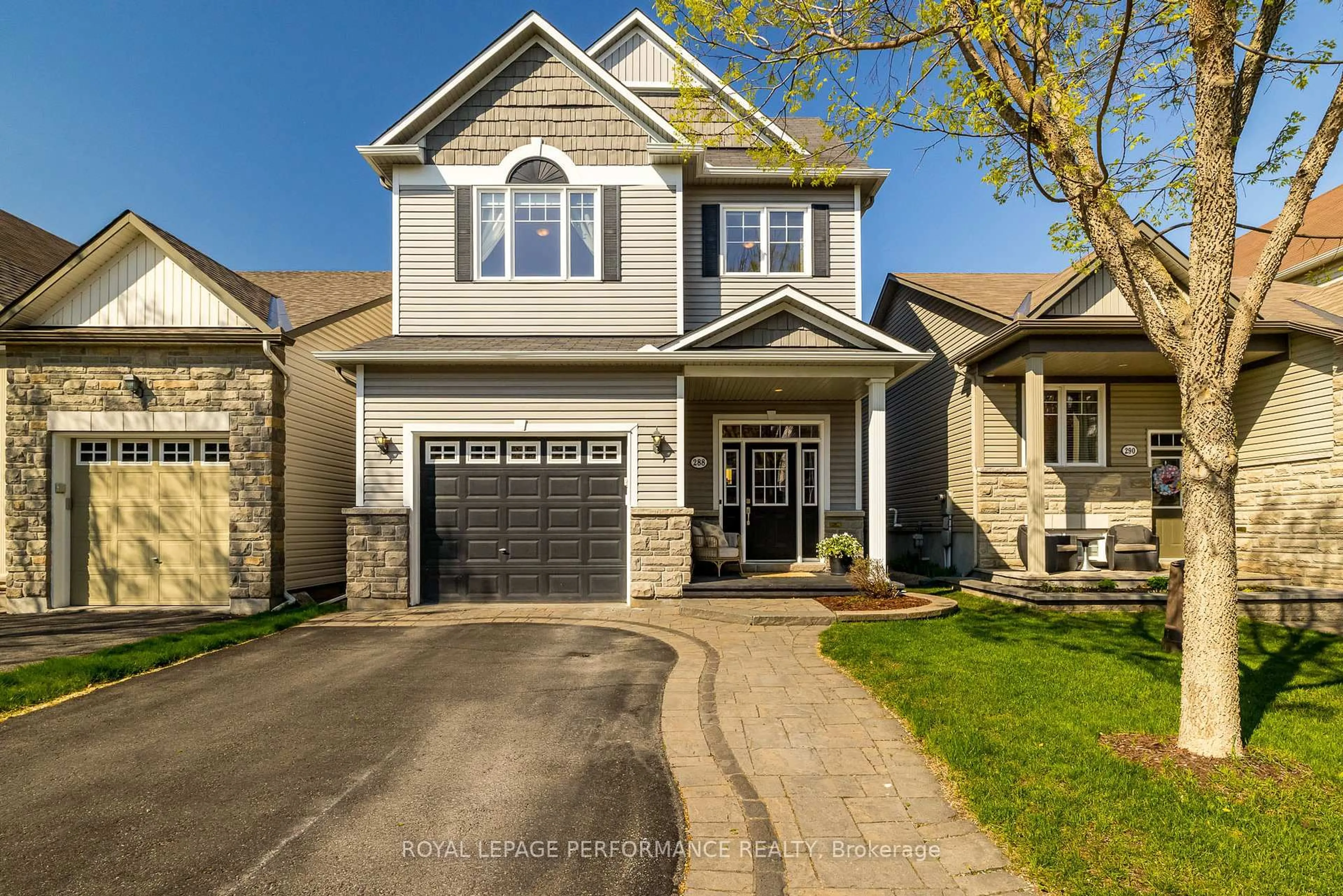 Home with vinyl exterior material, street for 288 Harthill Way, Ottawa Ontario K2J 0P3