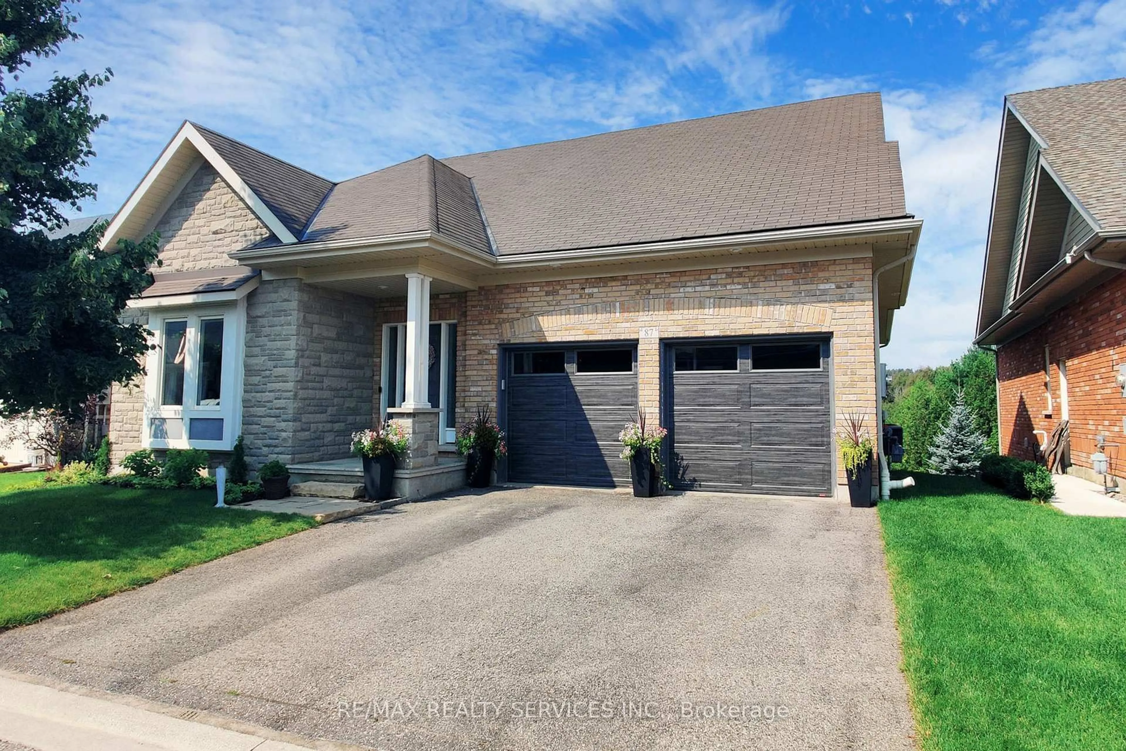 Home with brick exterior material, street for 200 Kingfisher Dr #87, Mono Ontario L9W 0B3