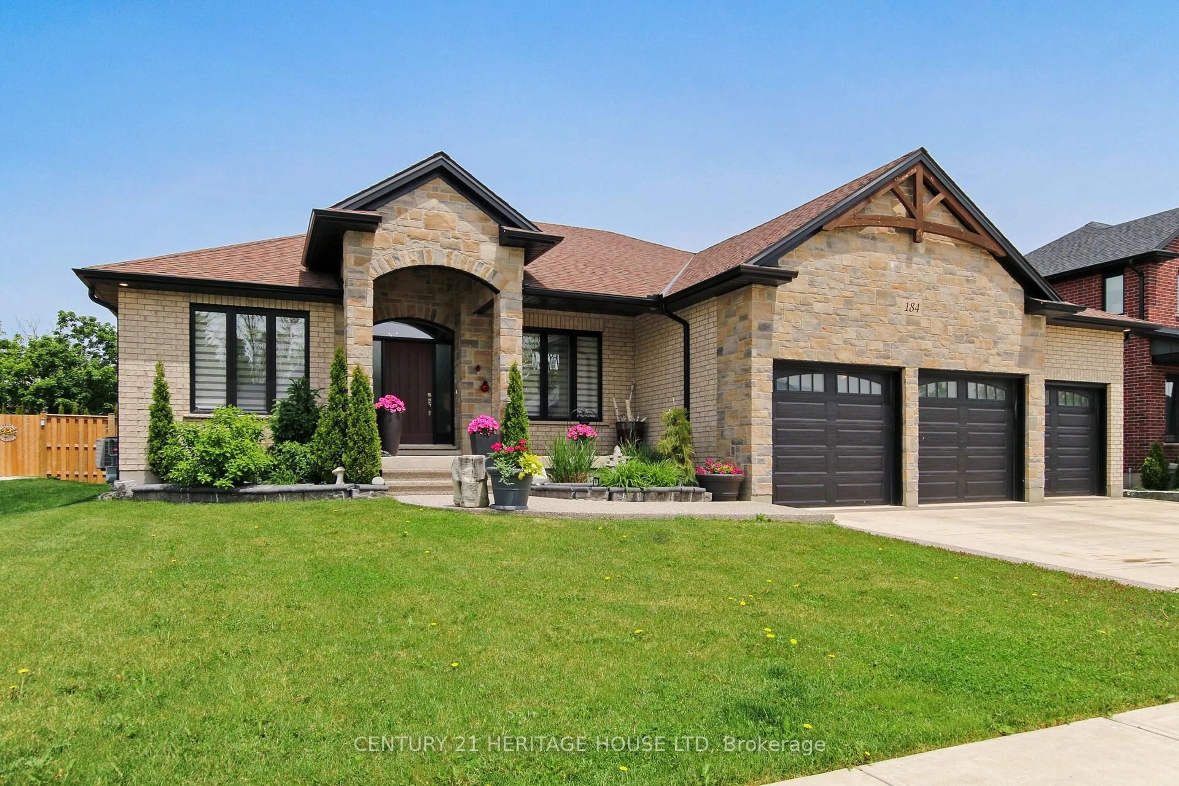 Home with brick exterior material, street for 184 Kettle Creek Dr, Central Elgin Ontario N0L 1B0
