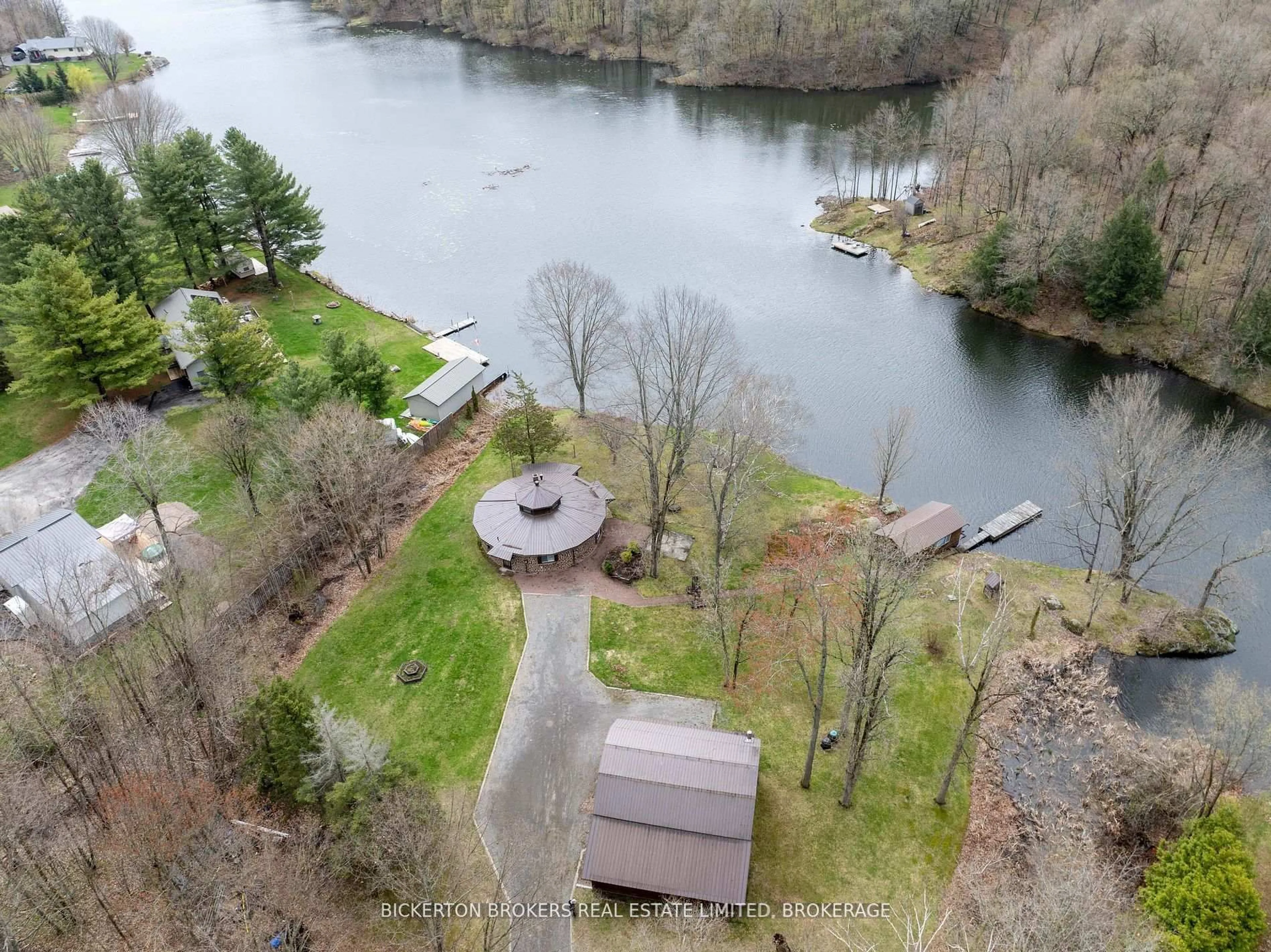 A pic from outside/outdoor area/front of a property/back of a property/a pic from drone, water/lake/river/ocean view for 851 Rideauwood Lane, Leeds and the Thousand Islands Ontario K0E 1N0