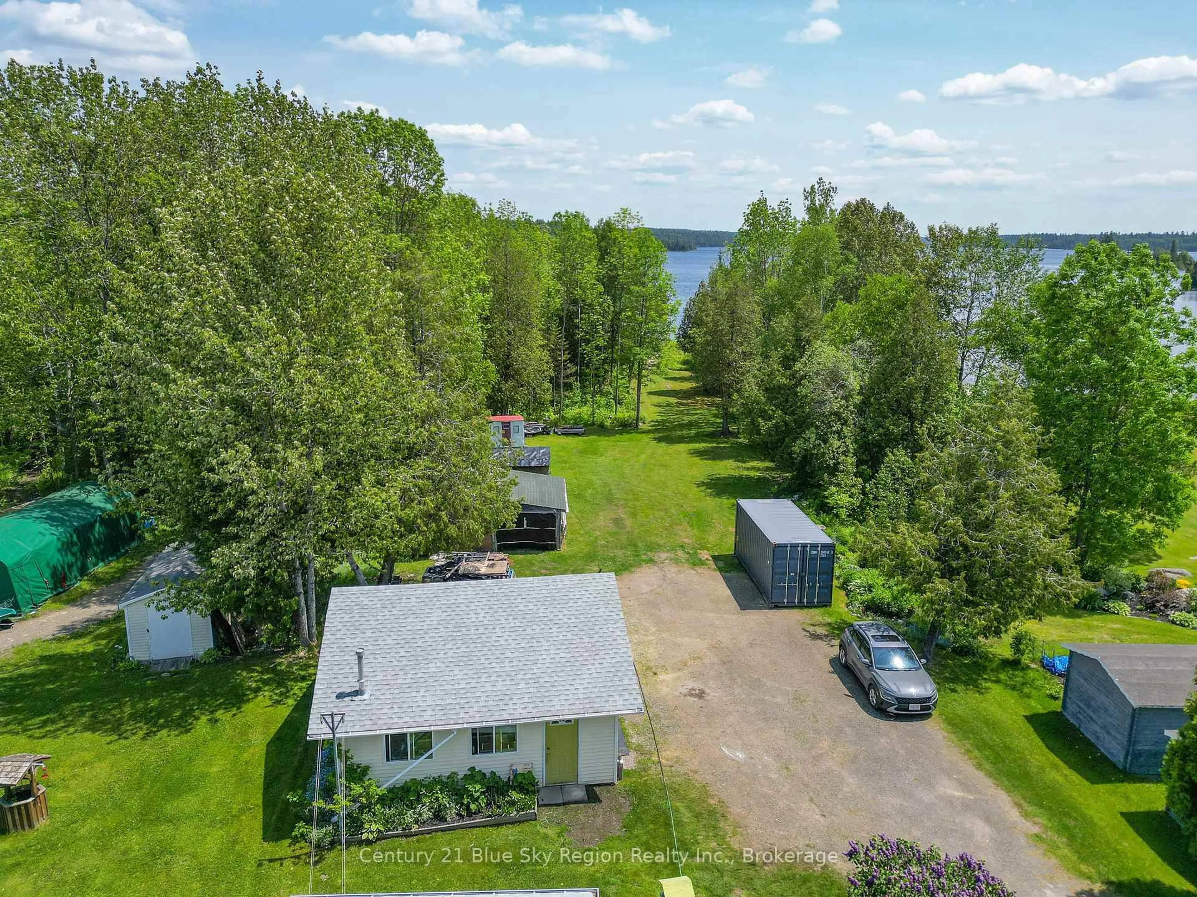 A pic from outside/outdoor area/front of a property/back of a property/a pic from drone, water/lake/river/ocean view for 69 Spruce Dr, Temagami Ontario P0H 2H0