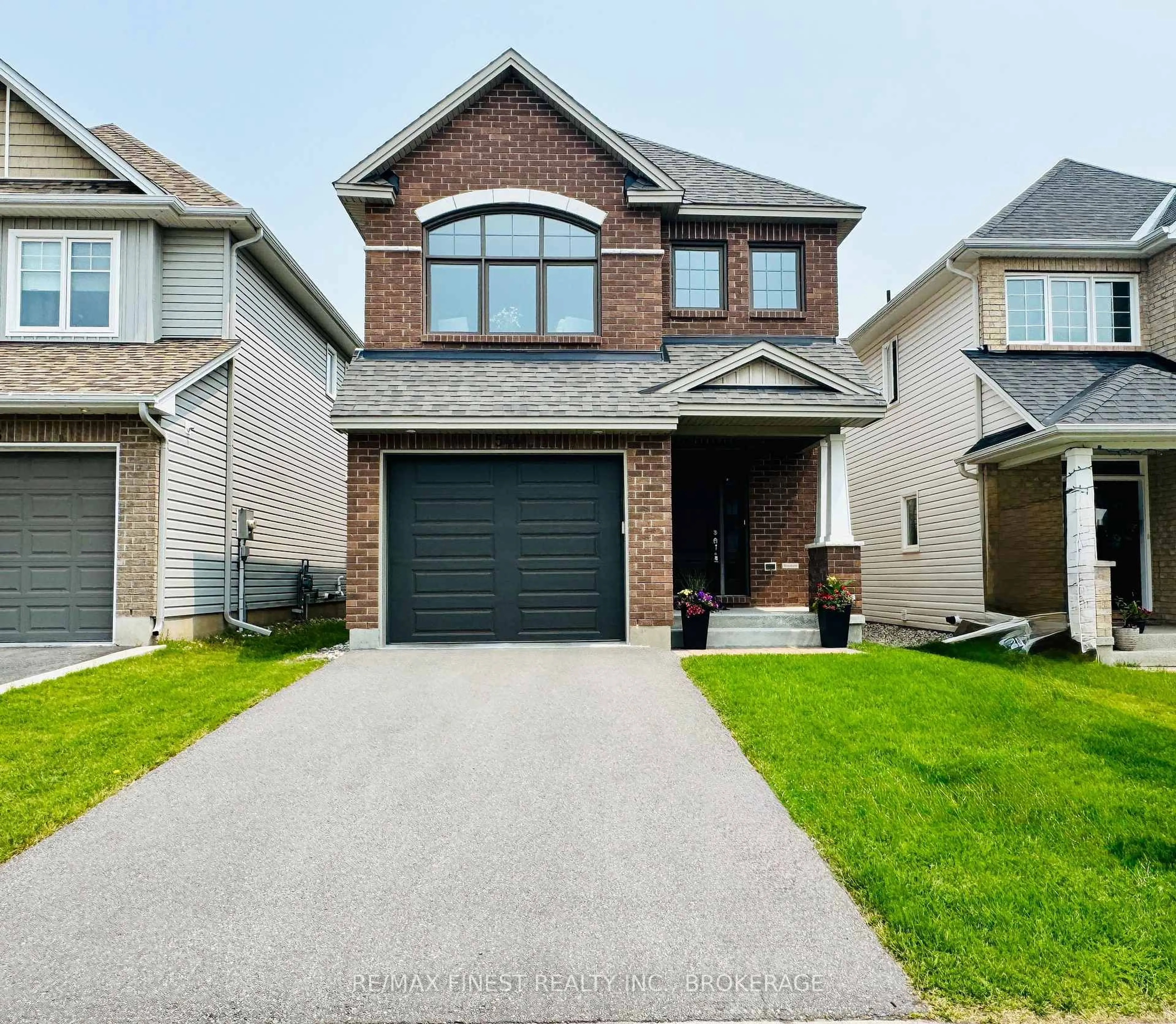 Home with brick exterior material, street for 544 Savannah Crt, Kingston Ontario K7P 0L3