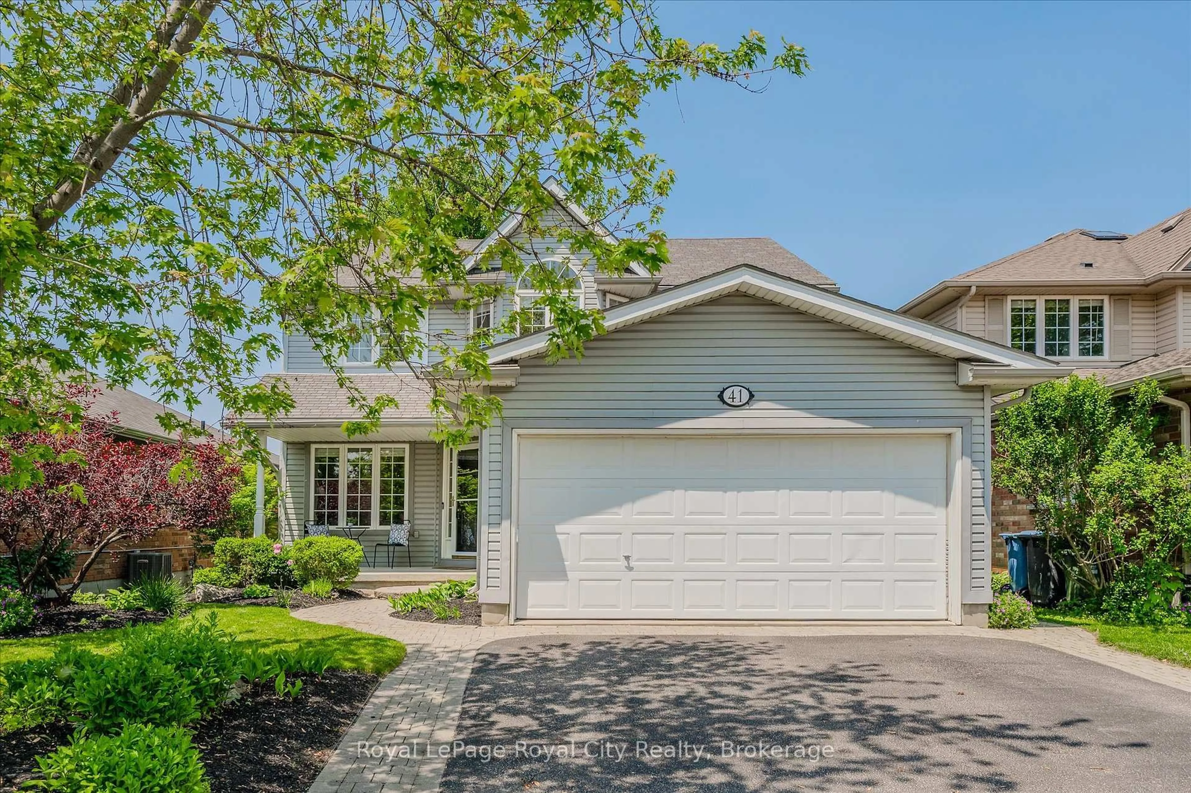 Home with vinyl exterior material, street for 41 Munroe Cres, Guelph Ontario N1G 5E5