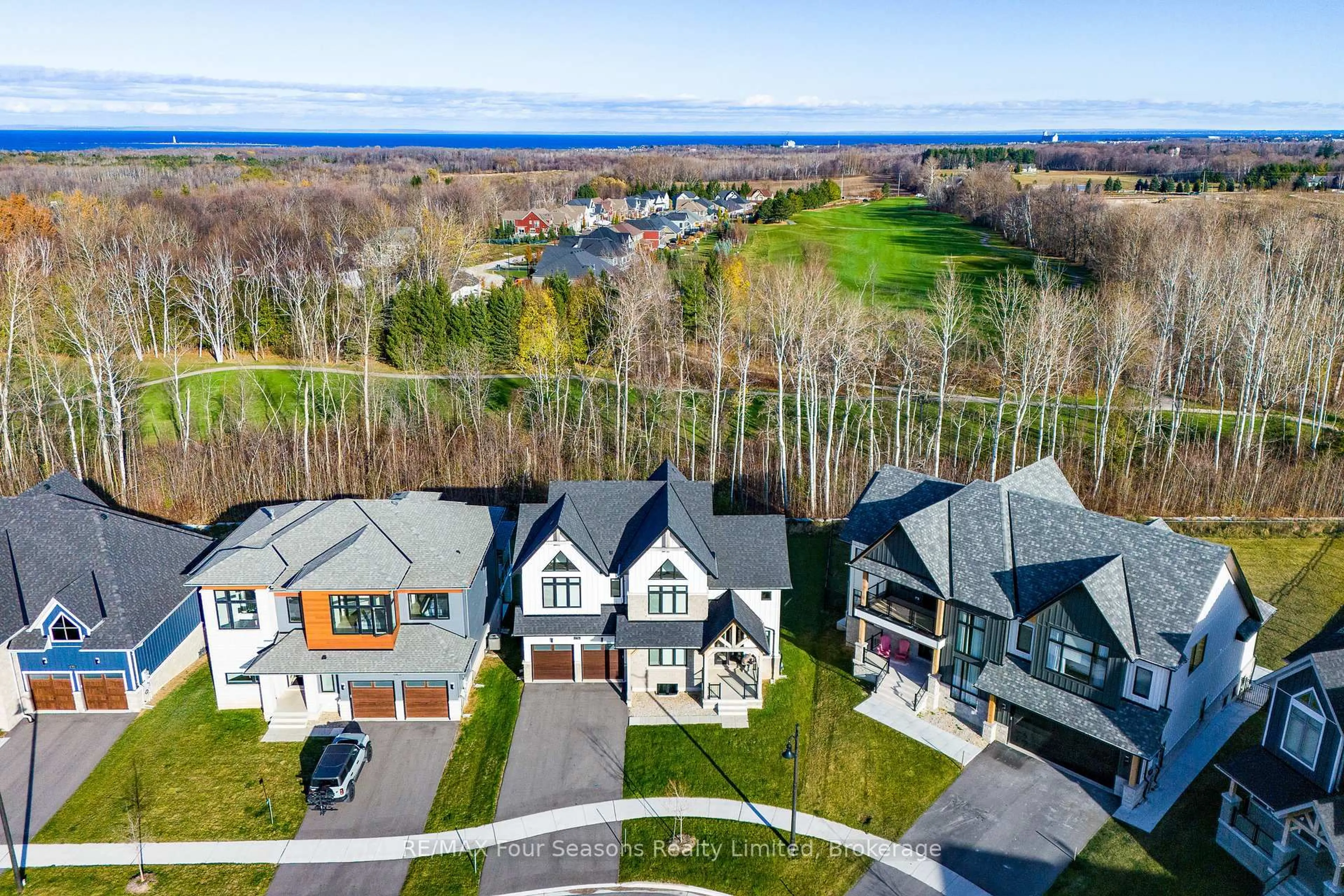 A pic from outside/outdoor area/front of a property/back of a property/a pic from drone, water/lake/river/ocean view for 176 Springside Cres, Blue Mountains Ontario L9Y 5L3