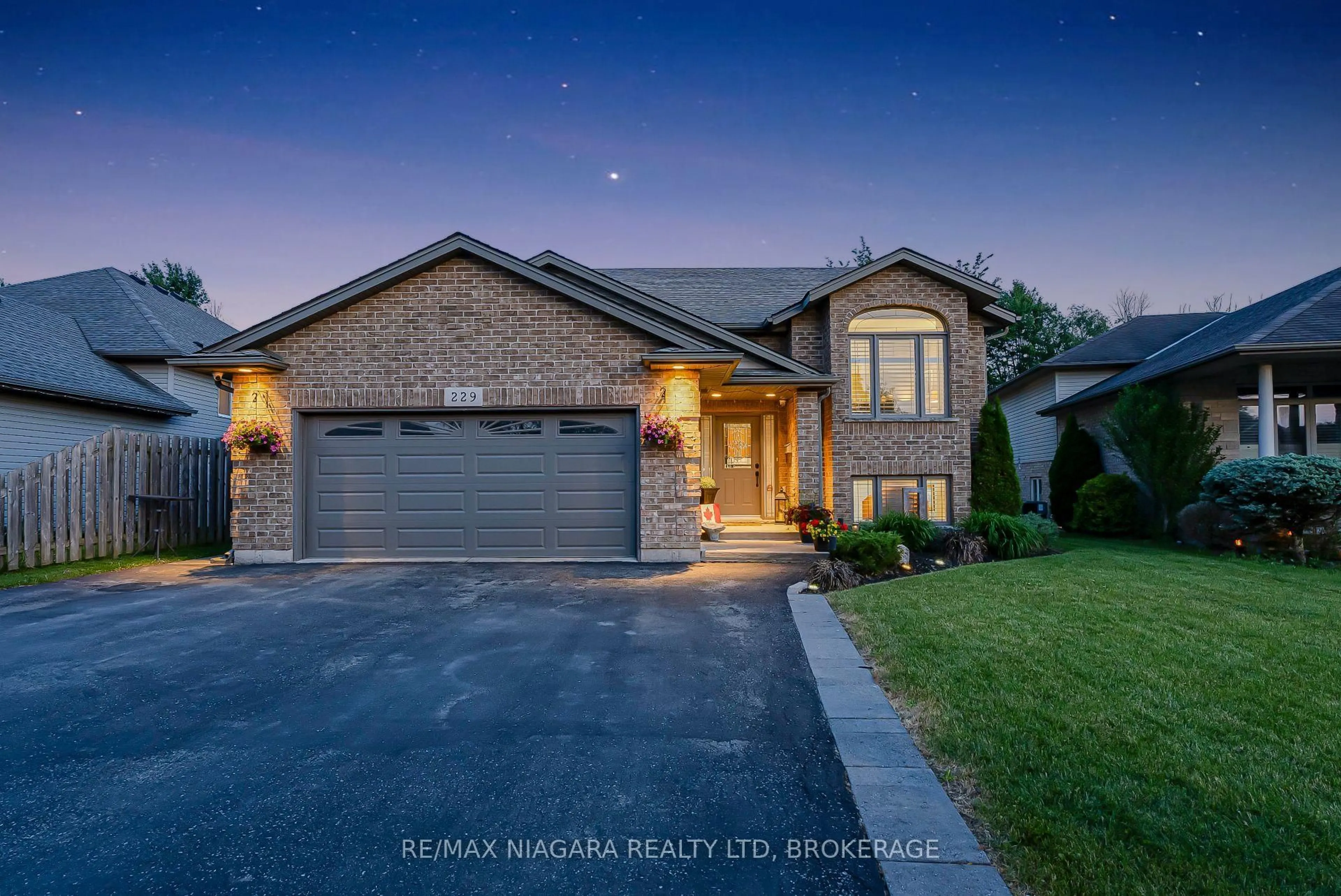Home with brick exterior material, street for 229 Wellbrook Blvd, Welland Ontario L3C 7M8