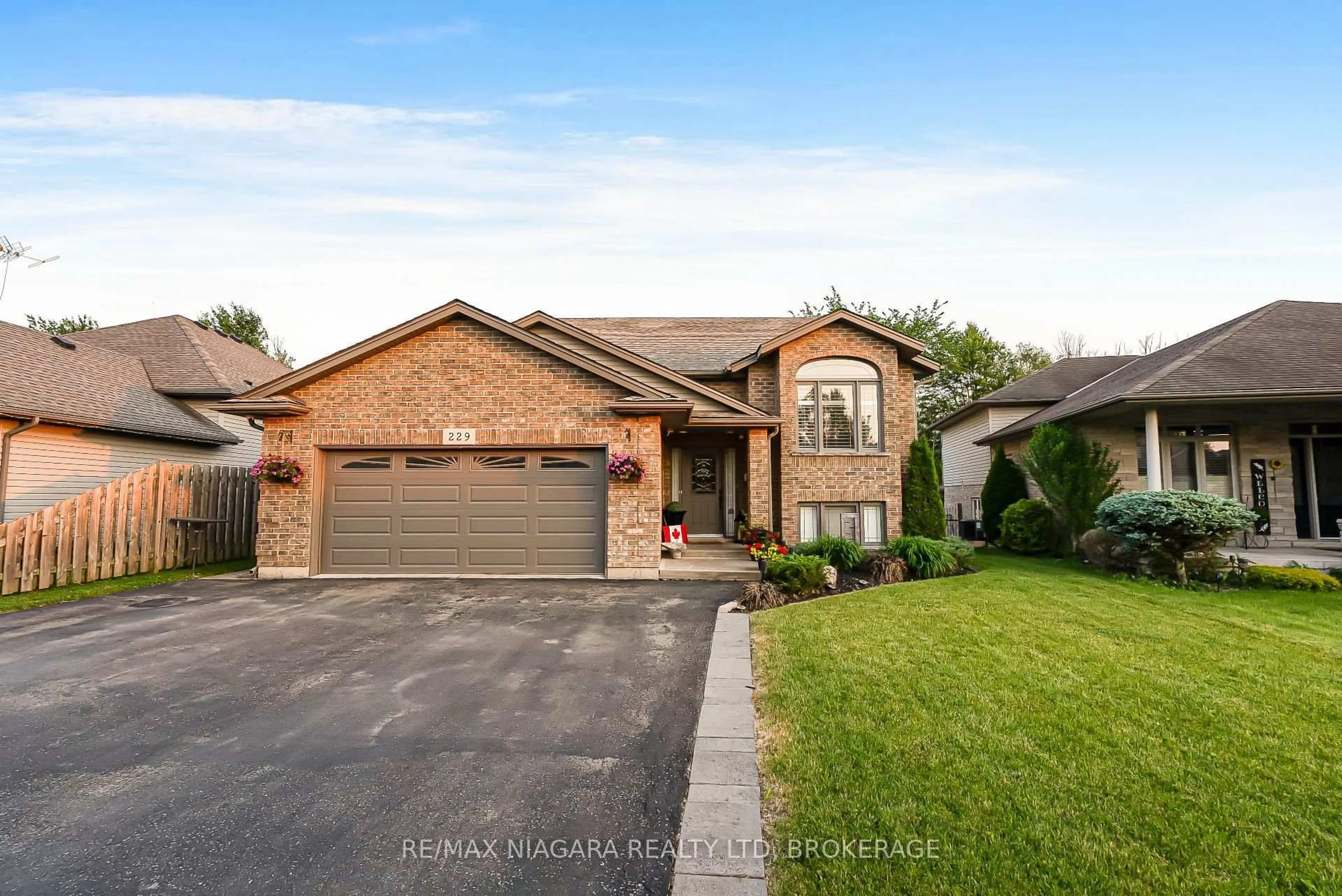 Home with brick exterior material, street for 229 Wellbrook Blvd, Welland Ontario L3C 7M8