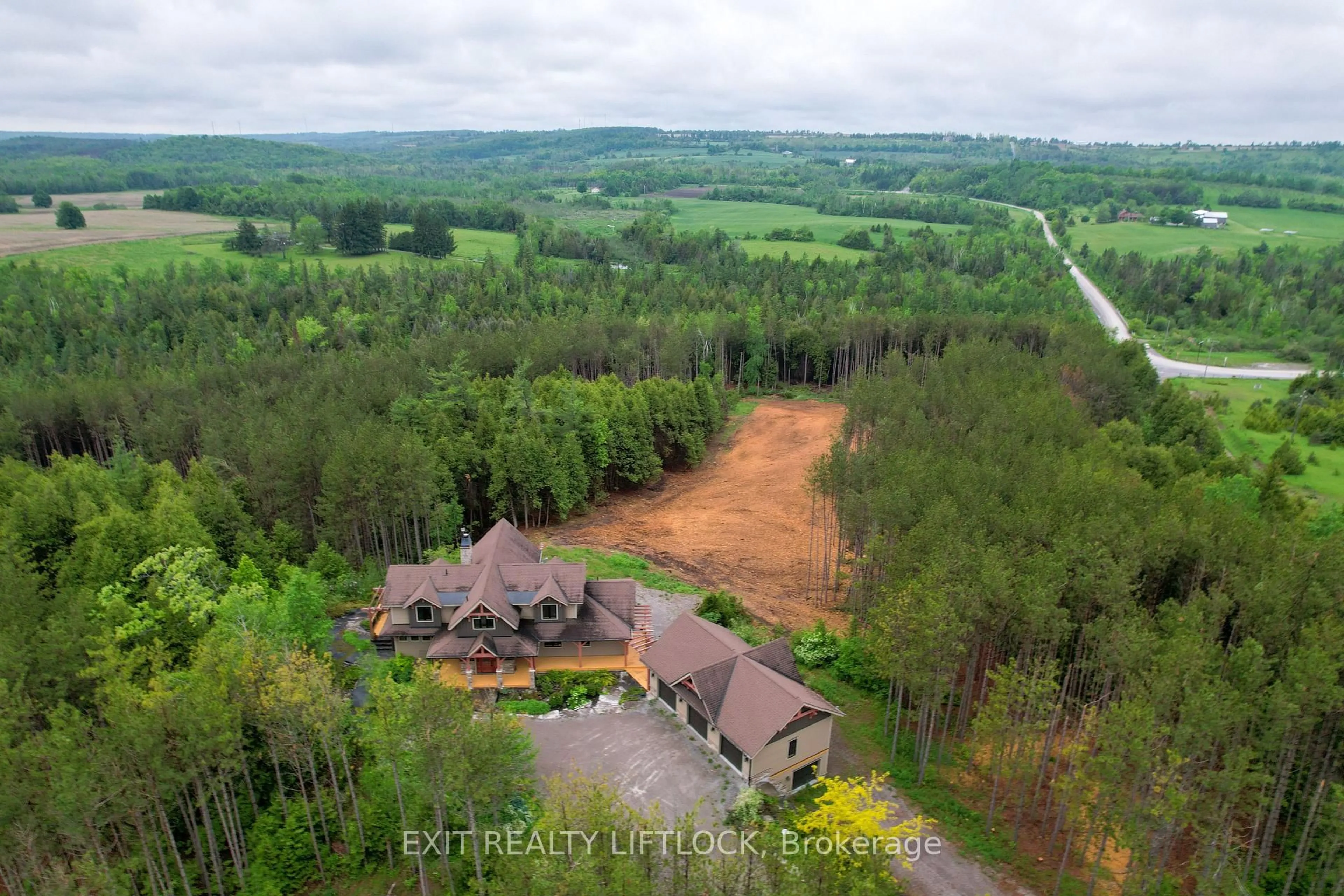 A pic from outside/outdoor area/front of a property/back of a property/a pic from drone, forest/trees view for 758 Lifford Rd, Kawartha Lakes Ontario L0A 1A0