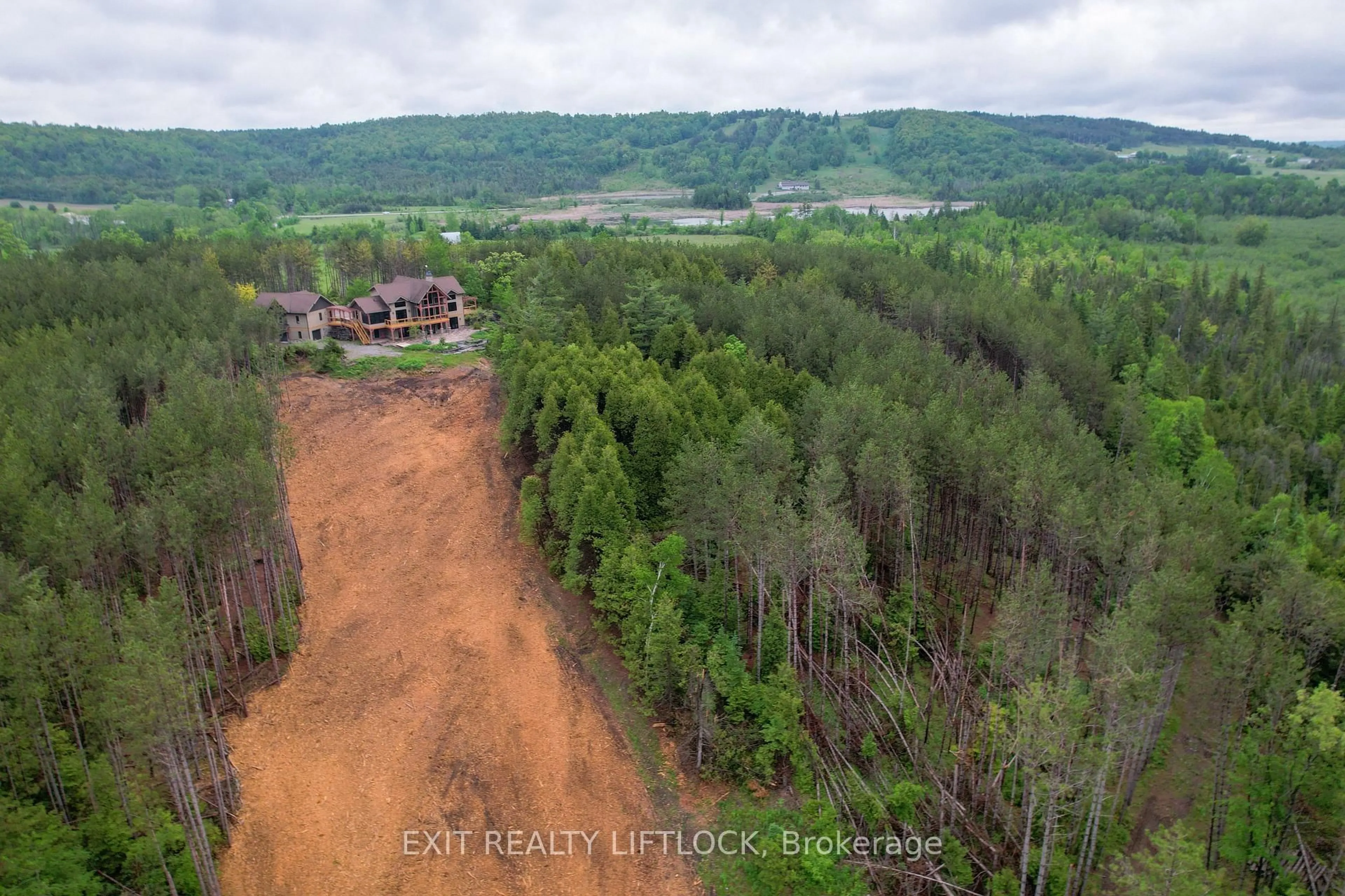 A pic from outside/outdoor area/front of a property/back of a property/a pic from drone, forest/trees view for 758 Lifford Rd, Kawartha Lakes Ontario L0A 1A0