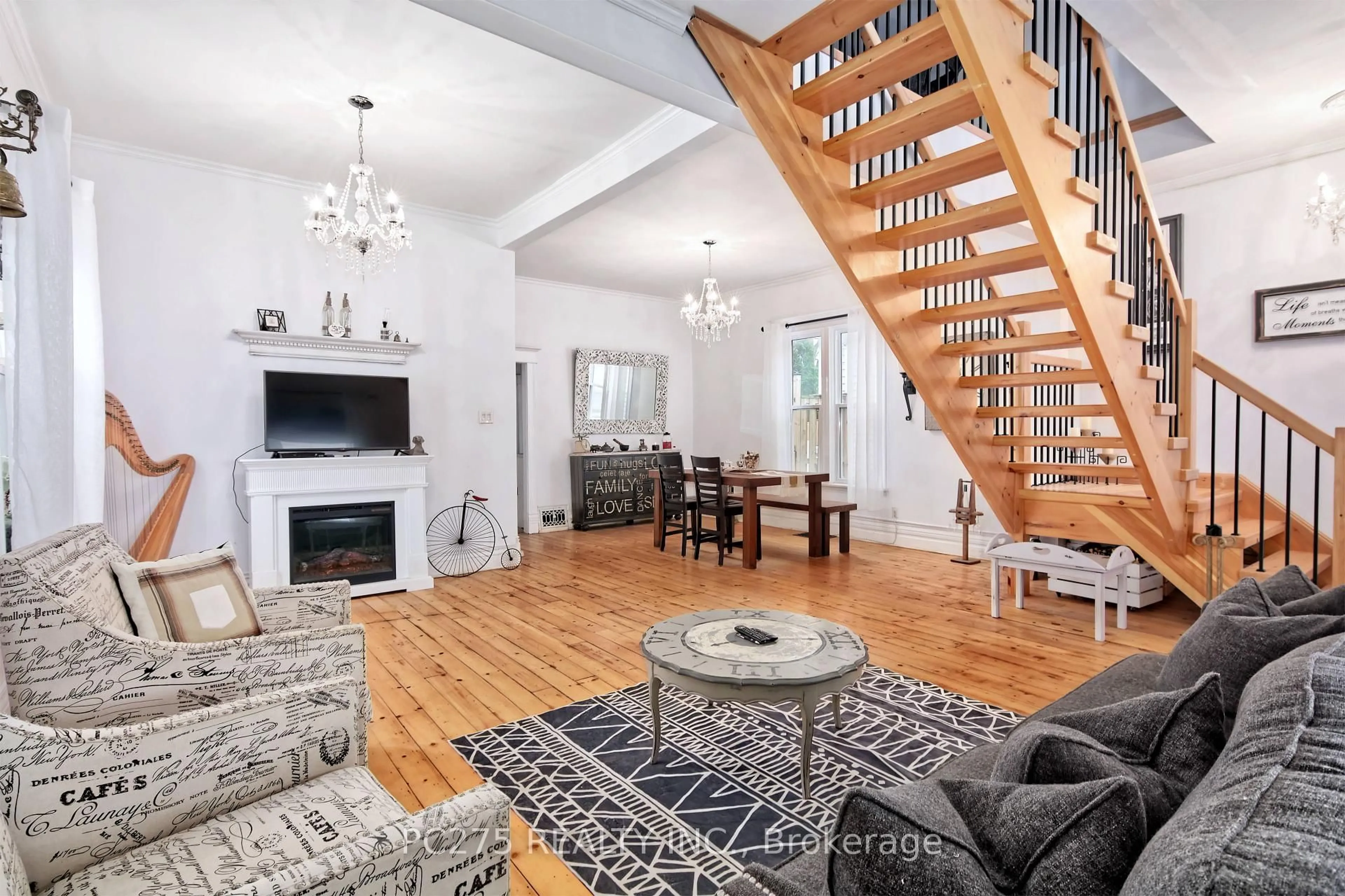 Living room with furniture, wood/laminate floor for 971 Elias St, London East Ontario N5W 3P5