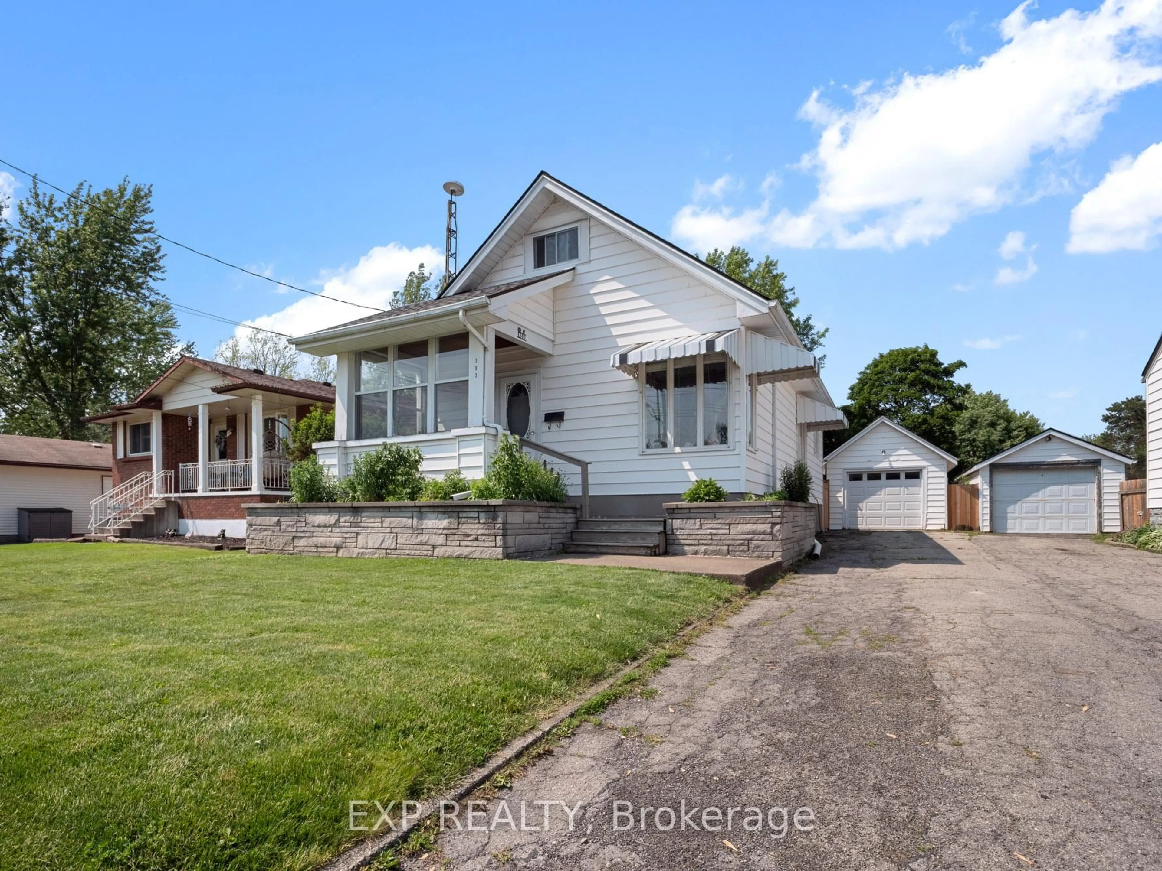 A pic from outside/outdoor area/front of a property/back of a property/a pic from drone, street for 303 Ash St, Port Colborne Ontario L3K 2X4