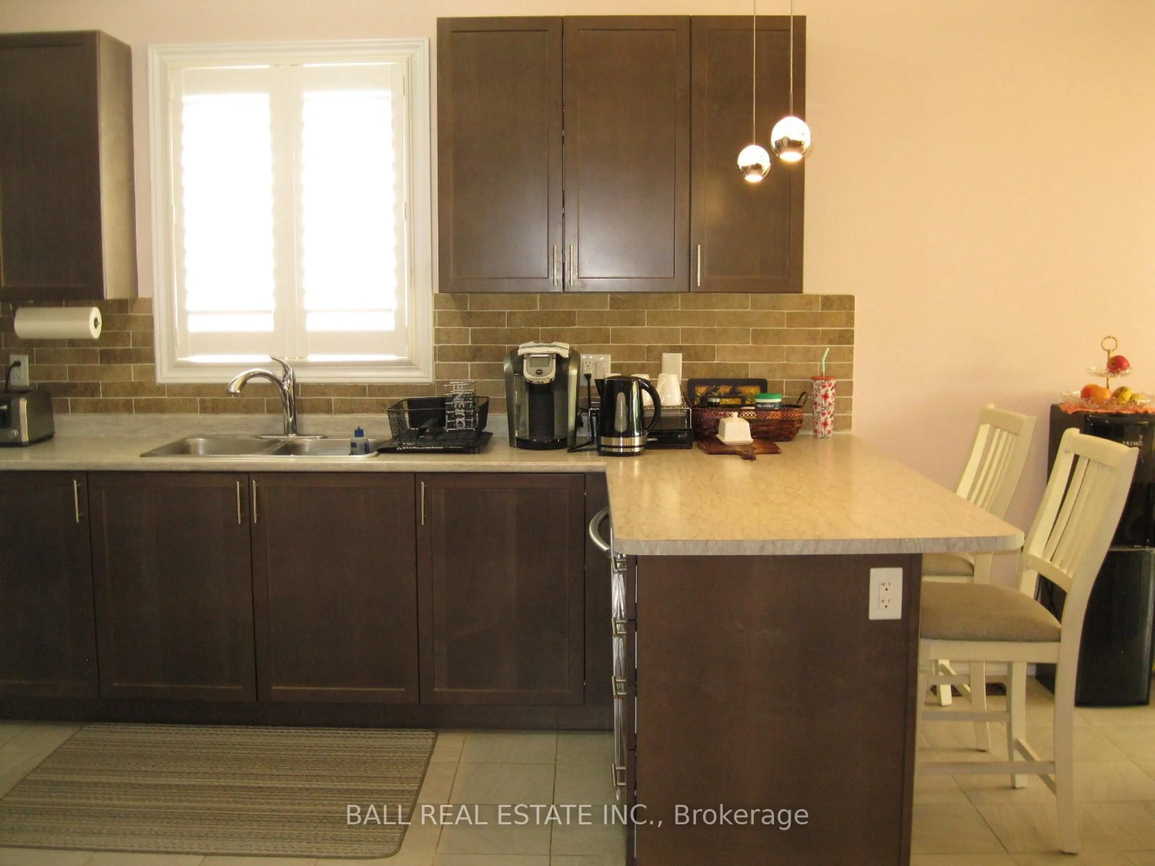Open concept kitchen, wood/laminate floor for 18 Lords Dr, Trent Hills Ontario K0L 1Y0