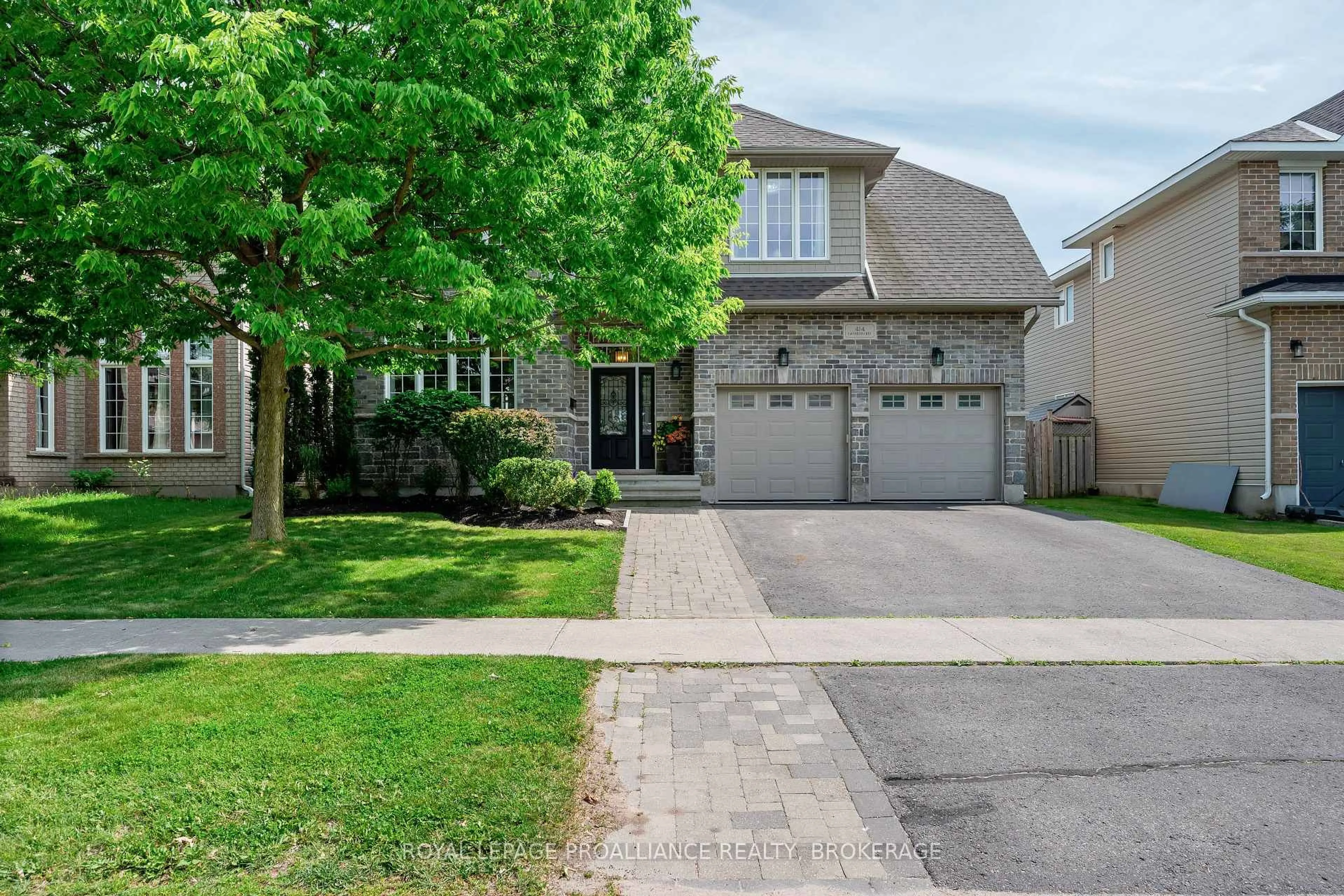 Home with brick exterior material, street for 414 Cavendish Cres, Kingston Ontario K7P 3E3