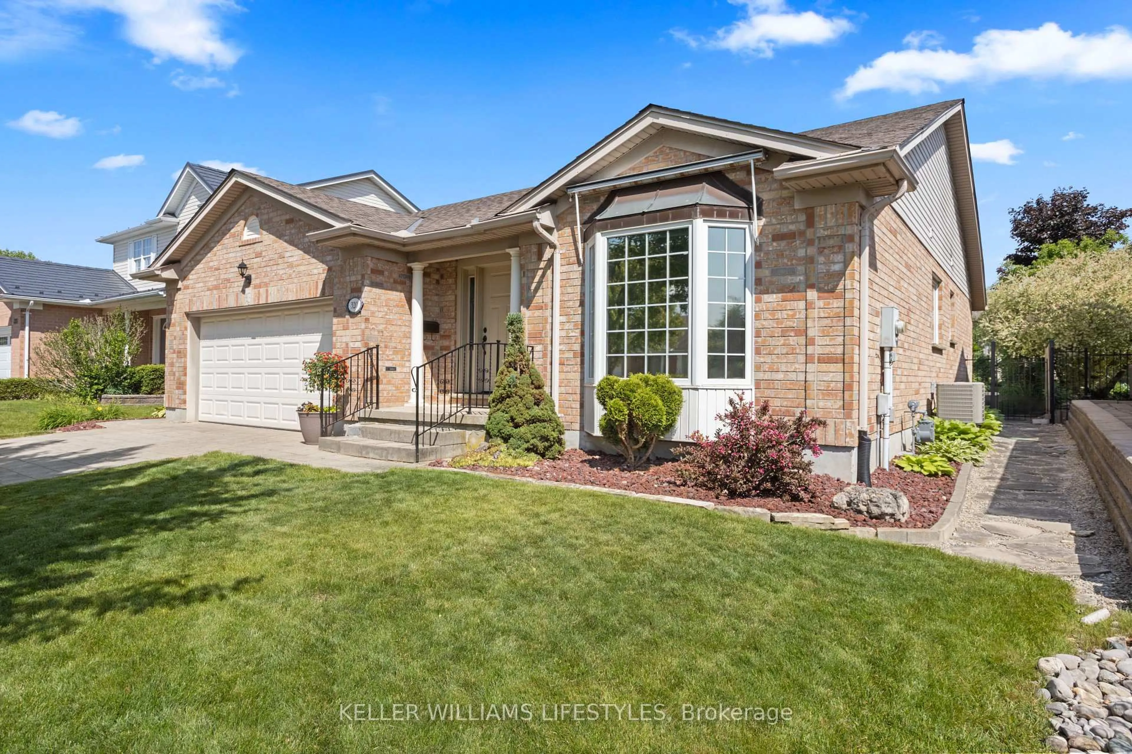 Home with brick exterior material, street for 320 Mcgarrell Dr, London North Ontario N6G 5E9