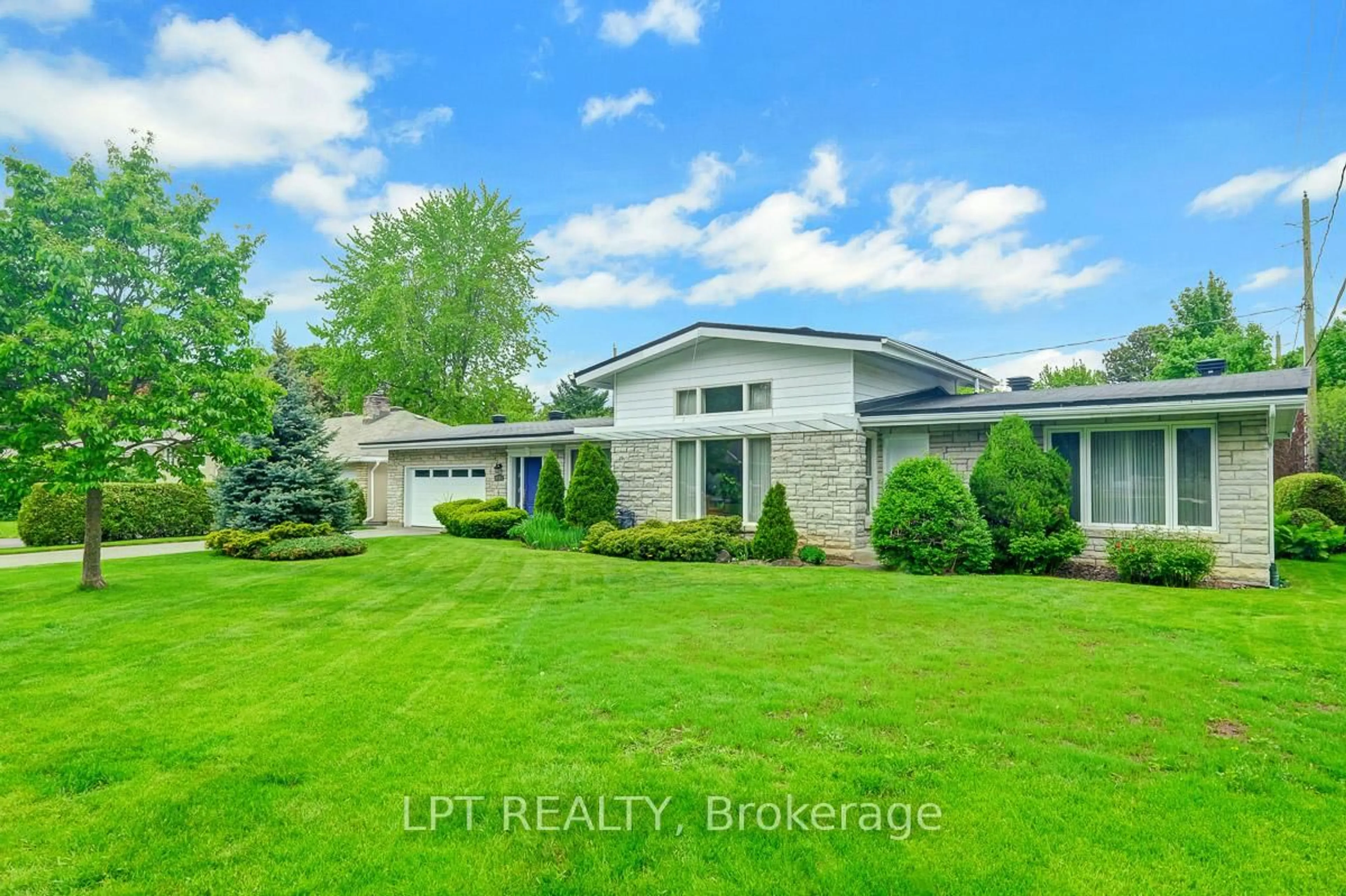 A pic from outside/outdoor area/front of a property/back of a property/a pic from drone, water/lake/river/ocean view for 169 Roger Rd, Ottawa Ontario K1H 5C7