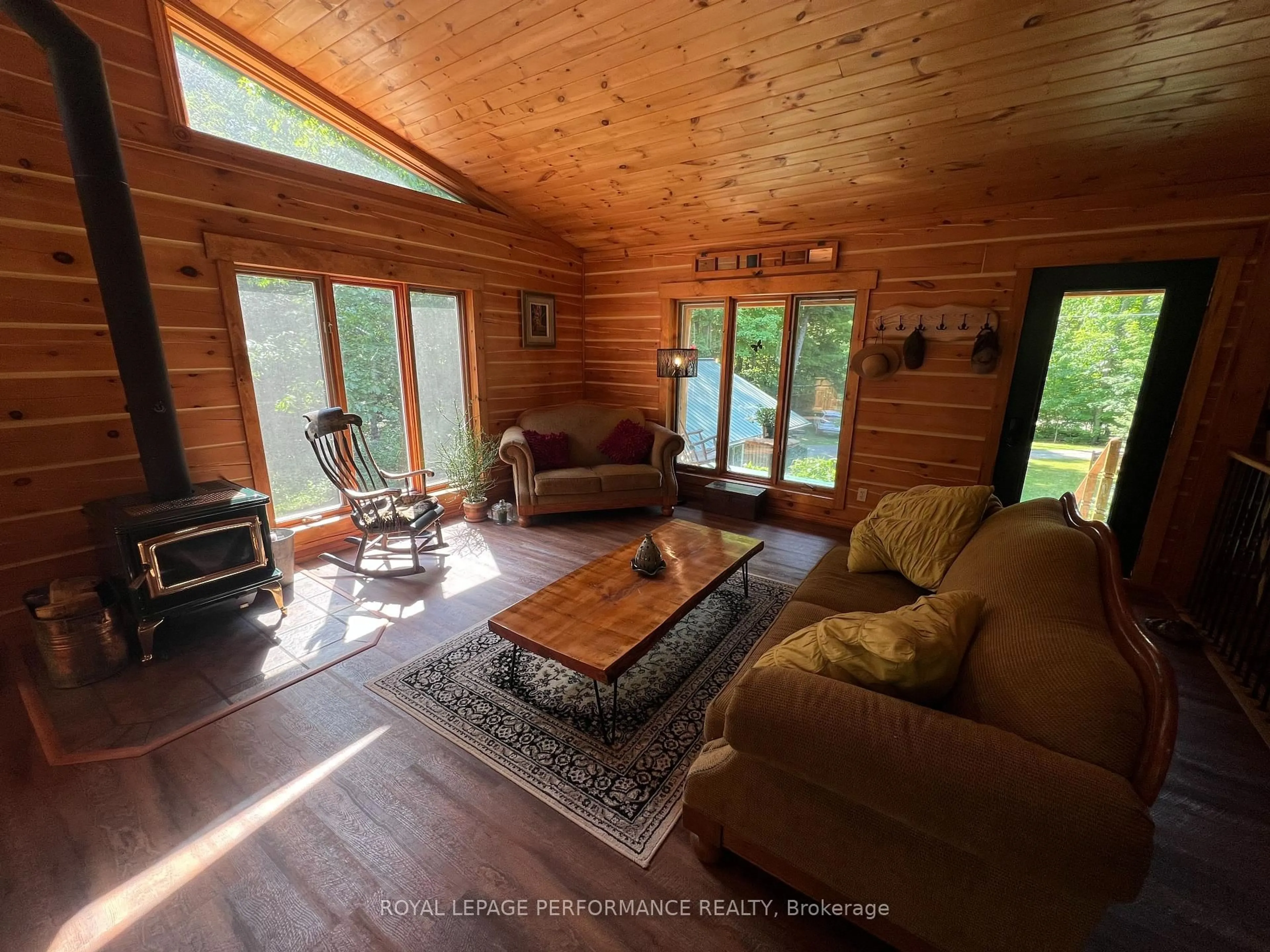 Living room with furniture, wood/laminate floor for 252 LACOURSE Lane, White Lake Ontario K0A 3L0