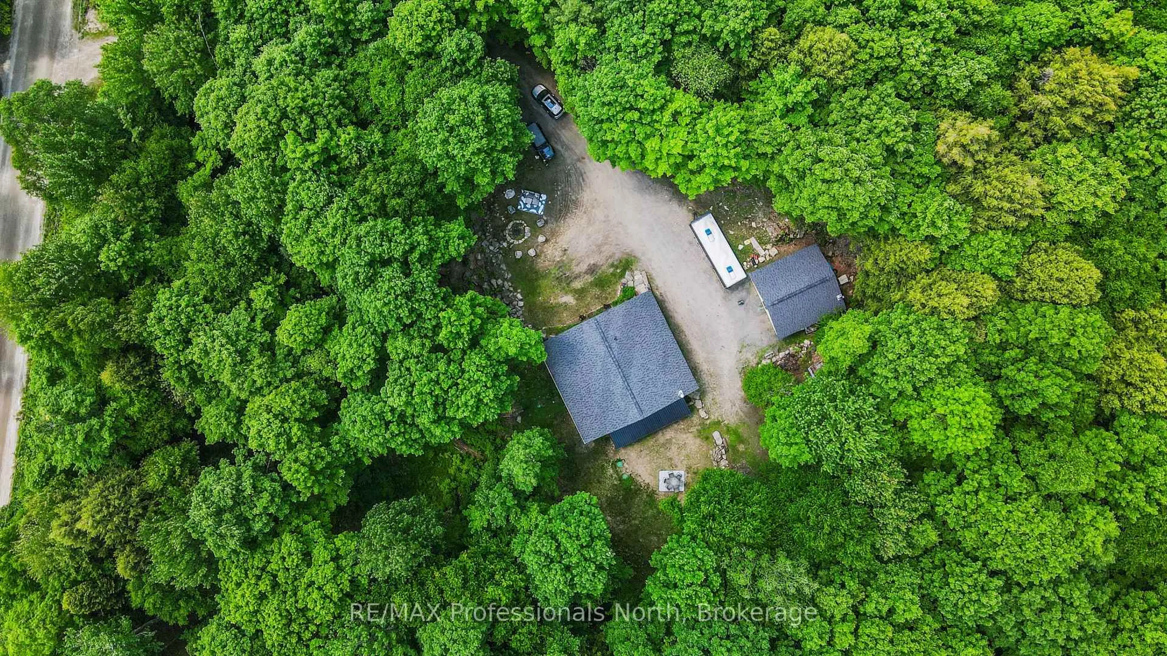 A pic from outside/outdoor area/front of a property/back of a property/a pic from drone, forest/trees view for 1336 Irish Line, Dysart et al Ontario K0M 1S0