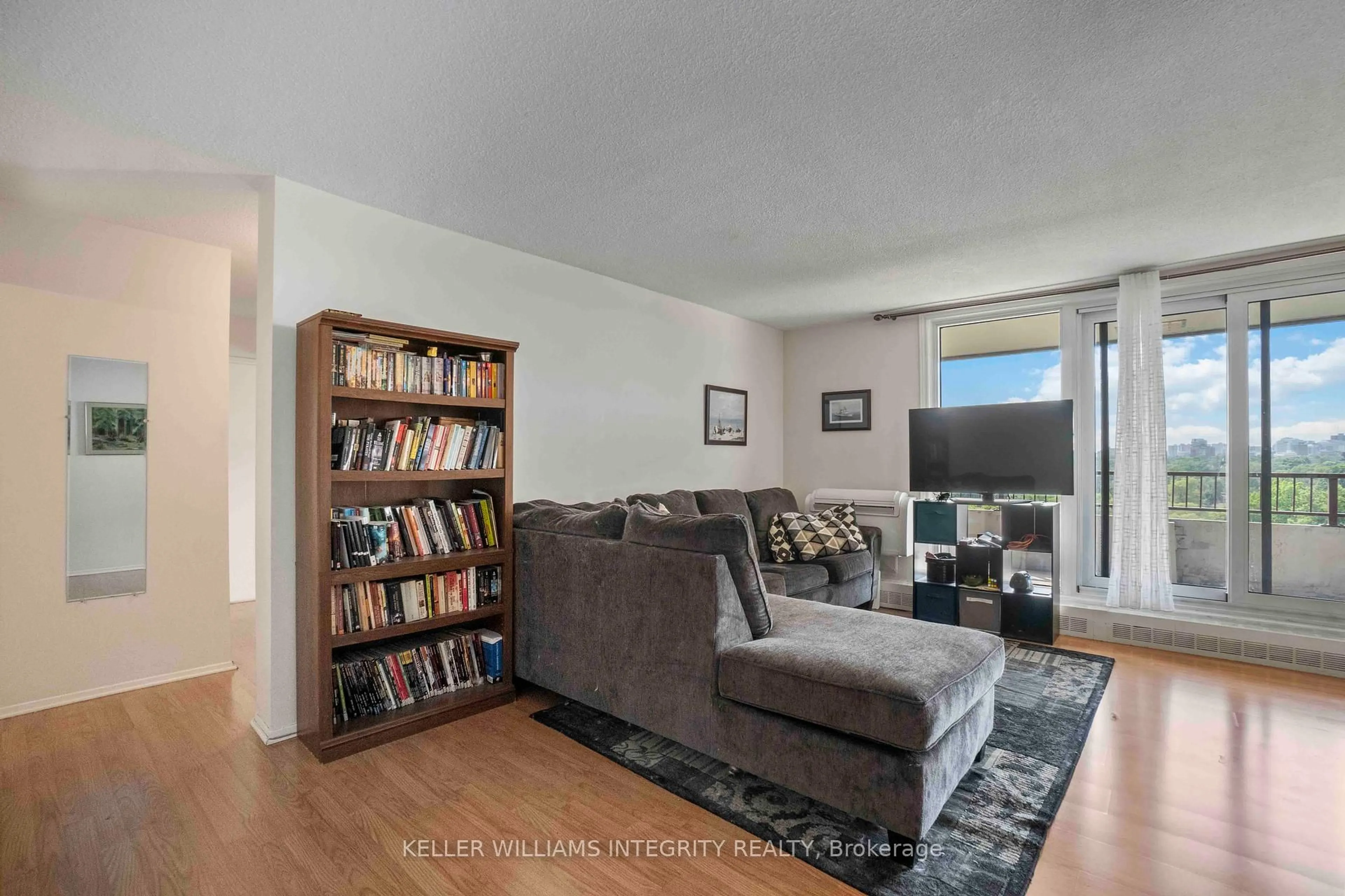 Living room with furniture, unknown for 1785 Frobisher Lane #1003, Ottawa Ontario K1G 3T7