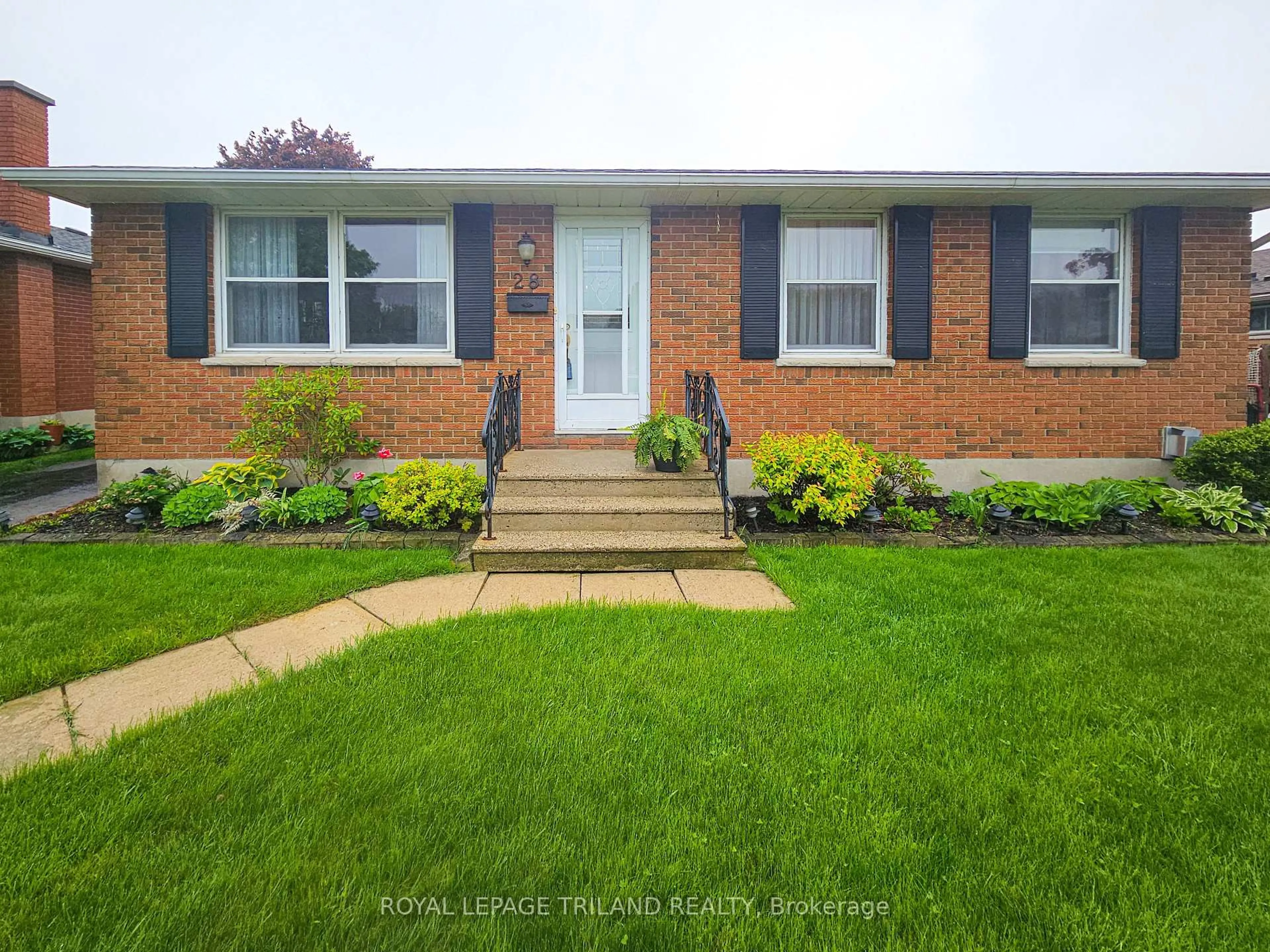 Home with brick exterior material, street for 28 Raven Ave, St. Thomas Ontario N5R 5L1